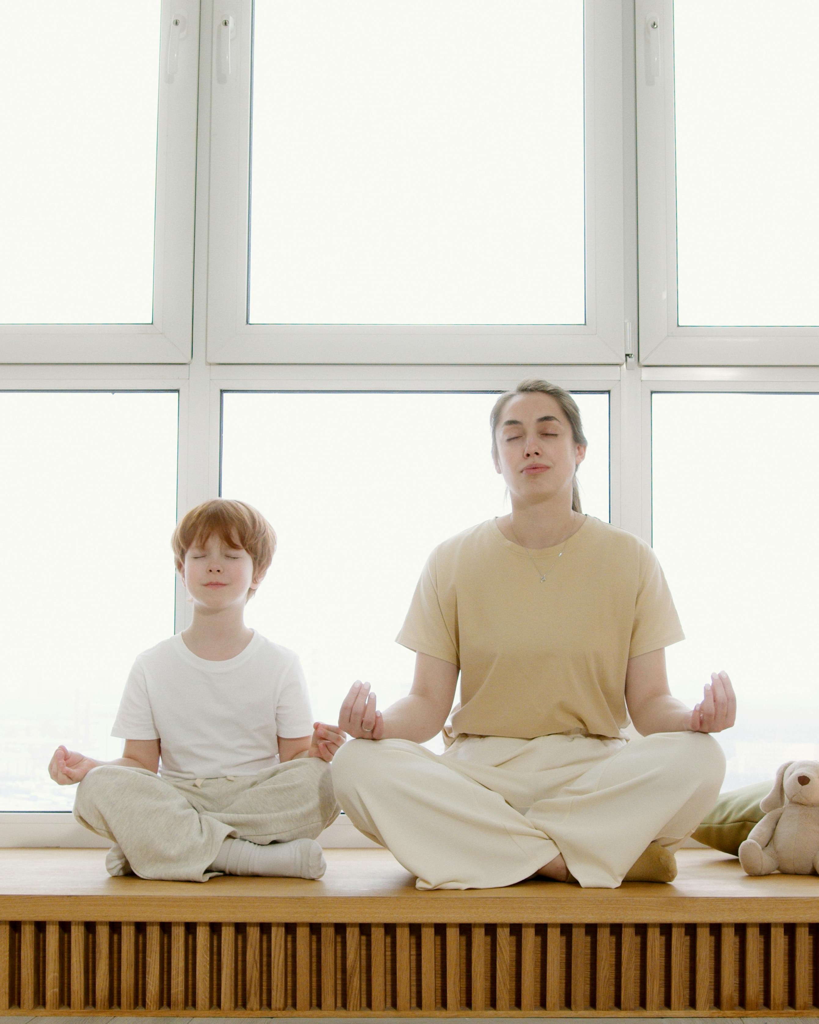Mother and Son Meditating Together