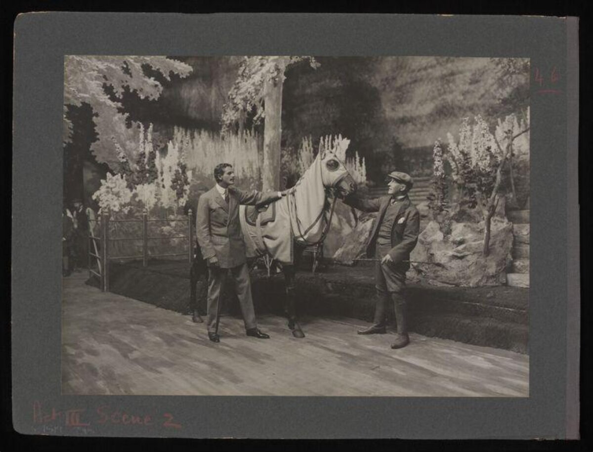 Two Men With Horse On Theater Stage