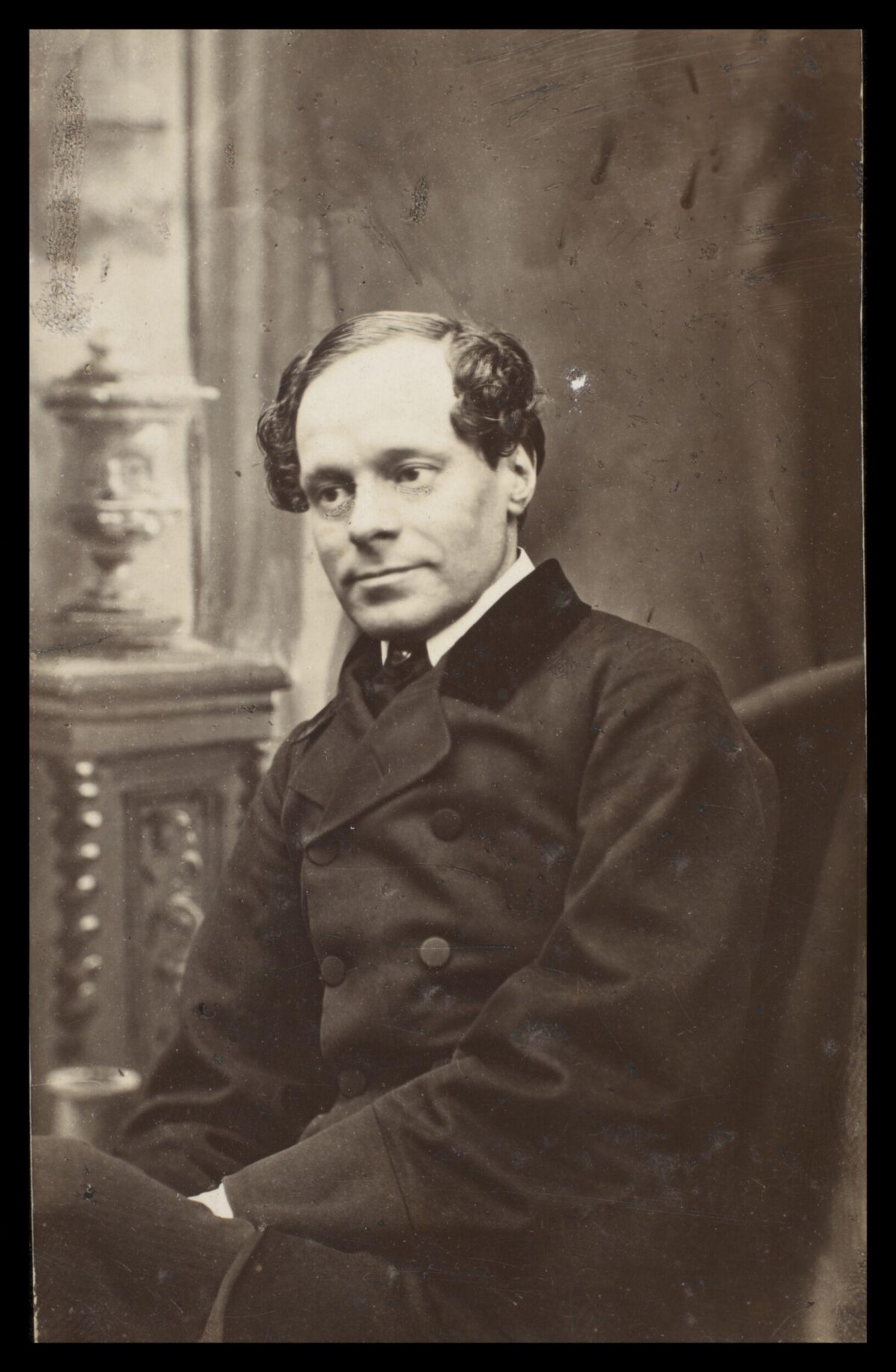 Vintage Portrait of Seated Victorian Man
