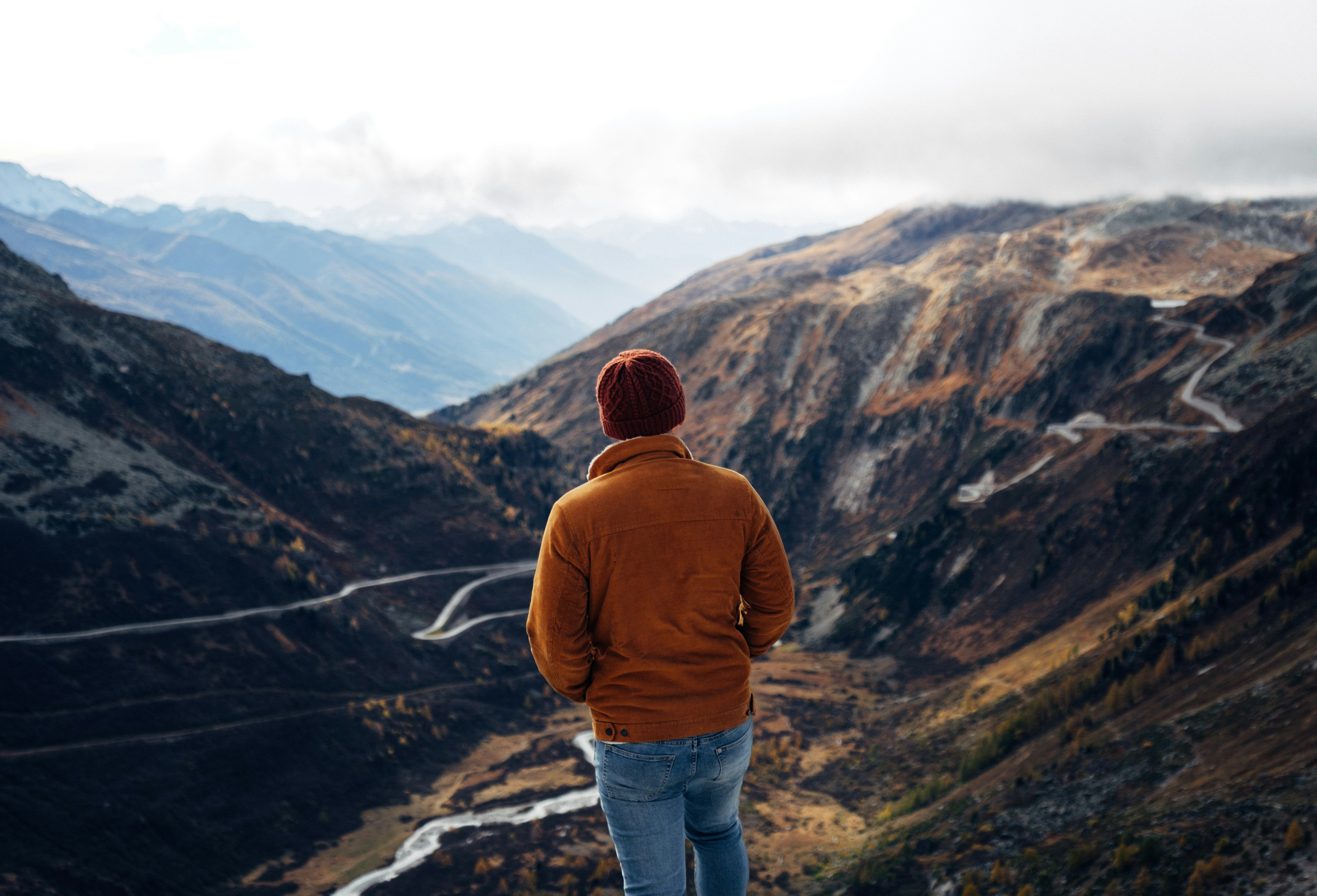 Hiker Overlooking Mountain Valley
