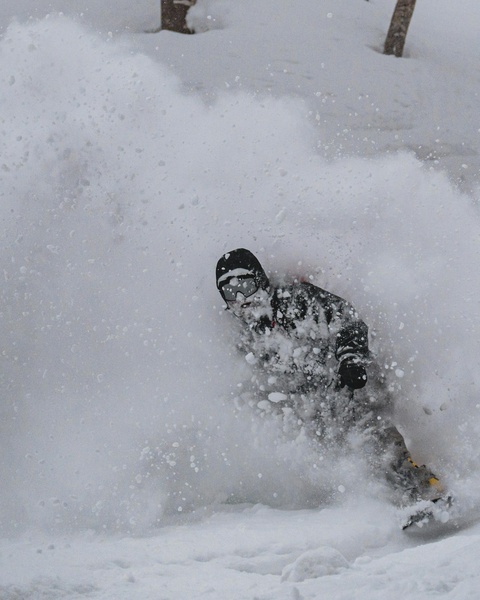 Snowboarder in Deep Powder Snow