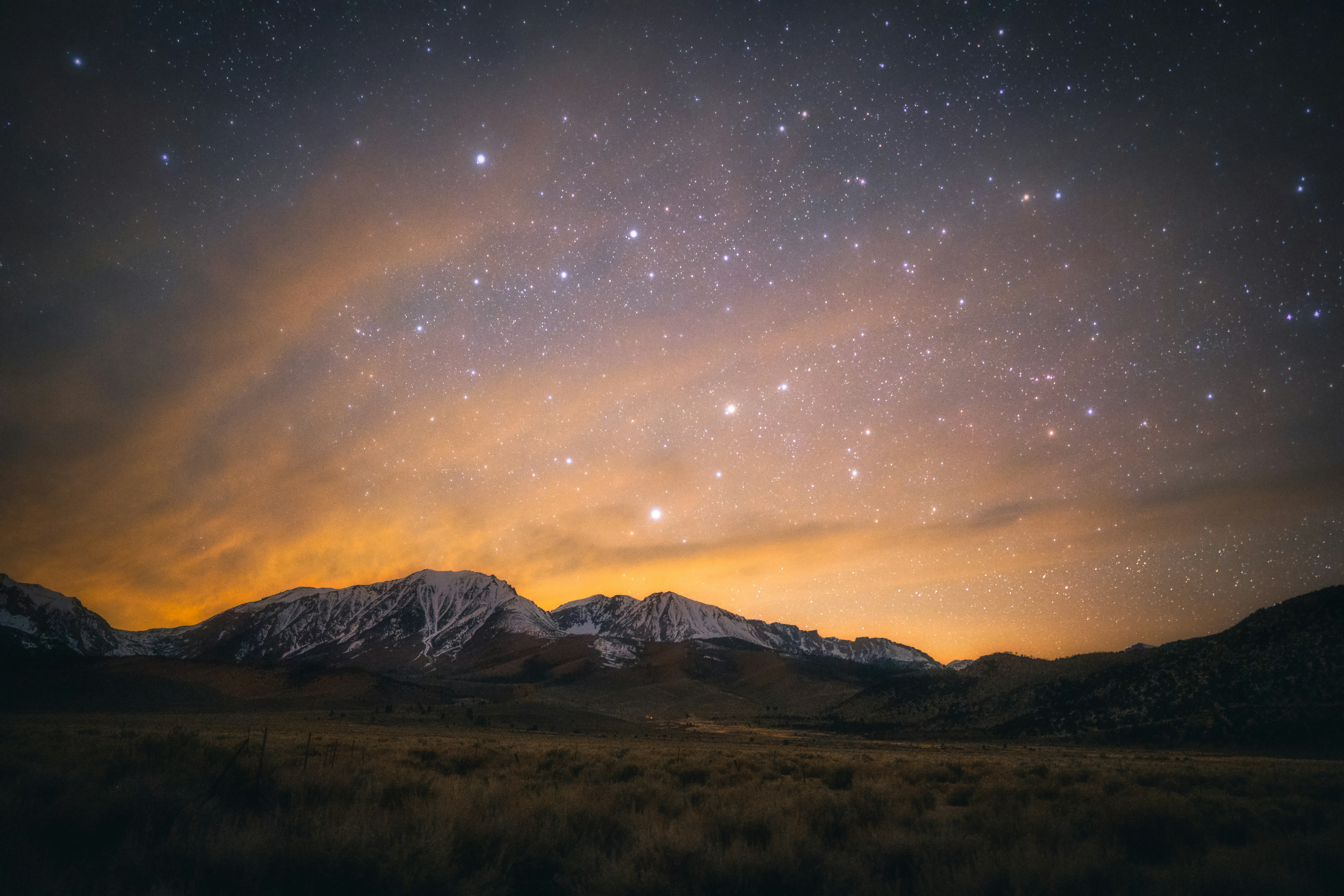 Starry Night Over Snow-capped Mountains