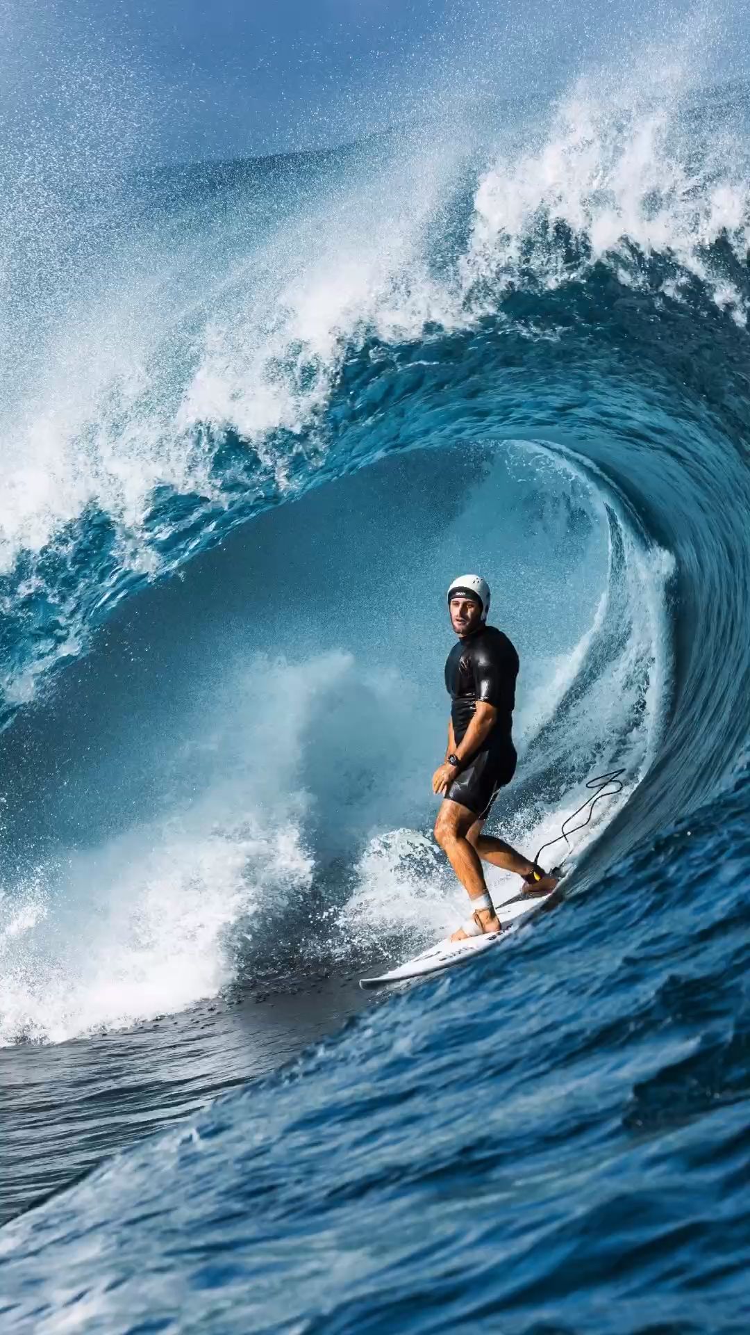 Surfer Riding a Barrel Wave