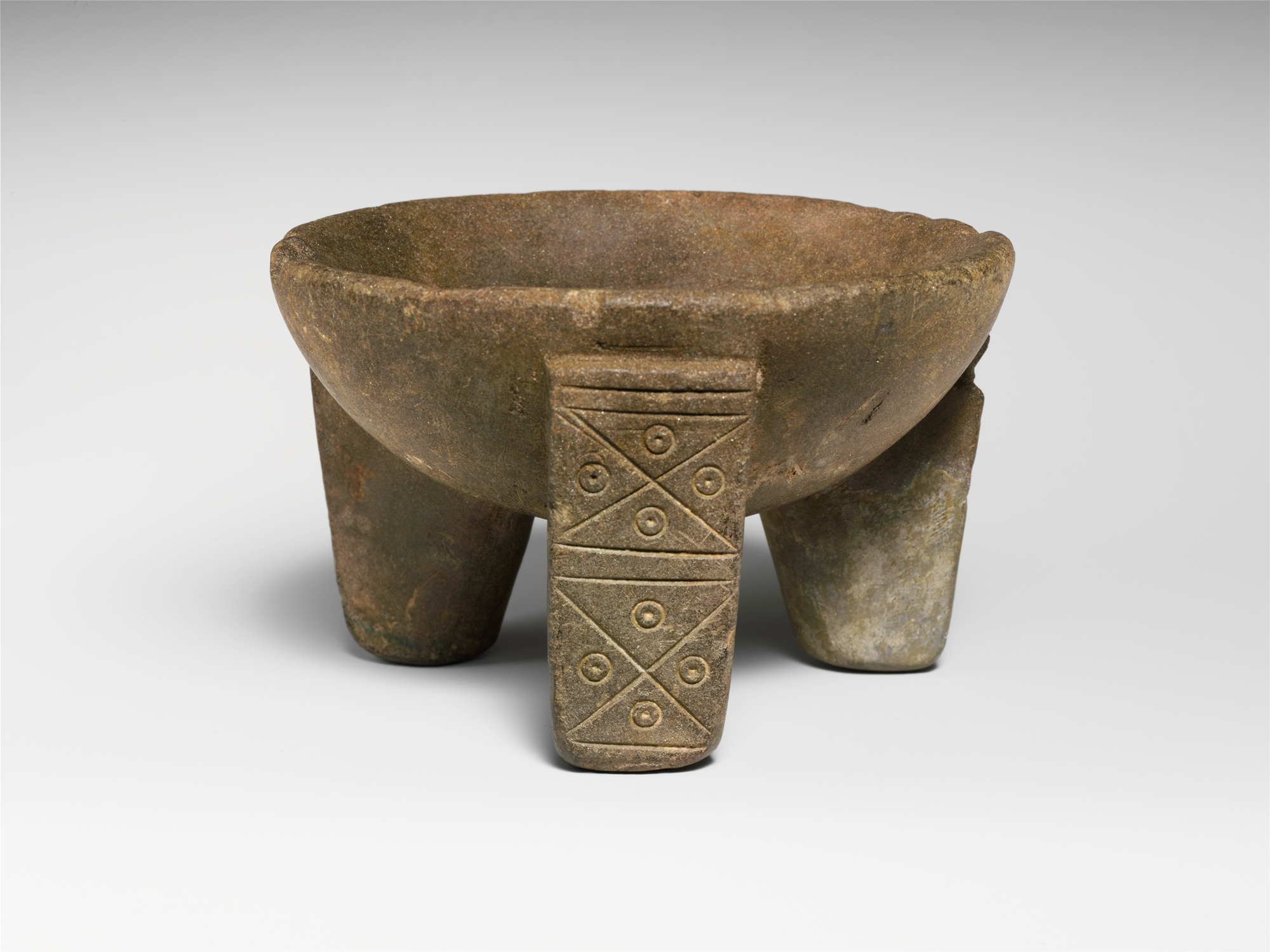 Ancient Carved Three-legged Stone Bowl