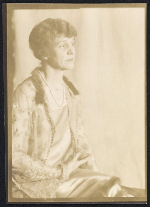 Vintage Sepia Portrait of a Seated Woman