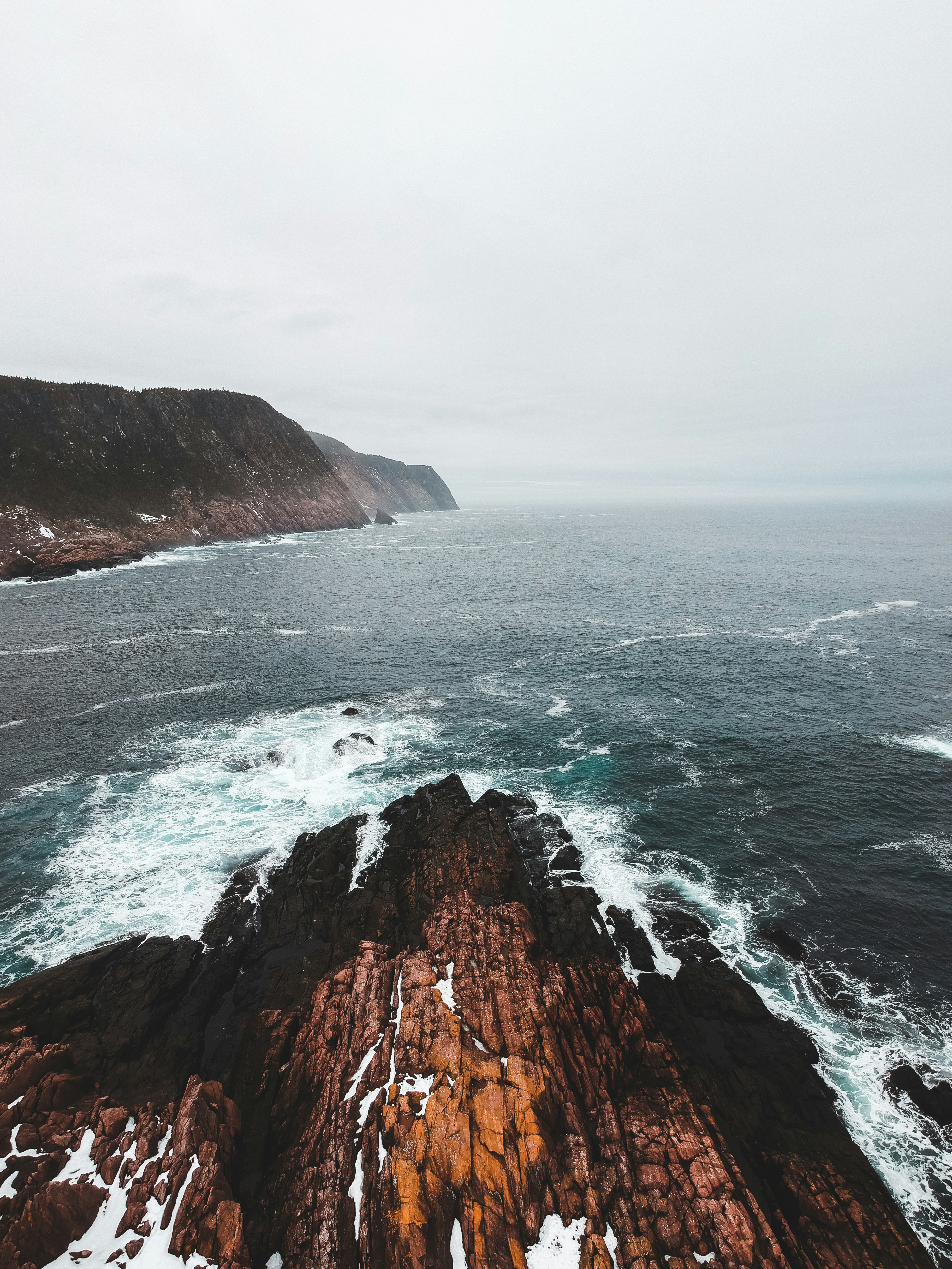 Rocky Coastal Seascape Under Overcast Sky