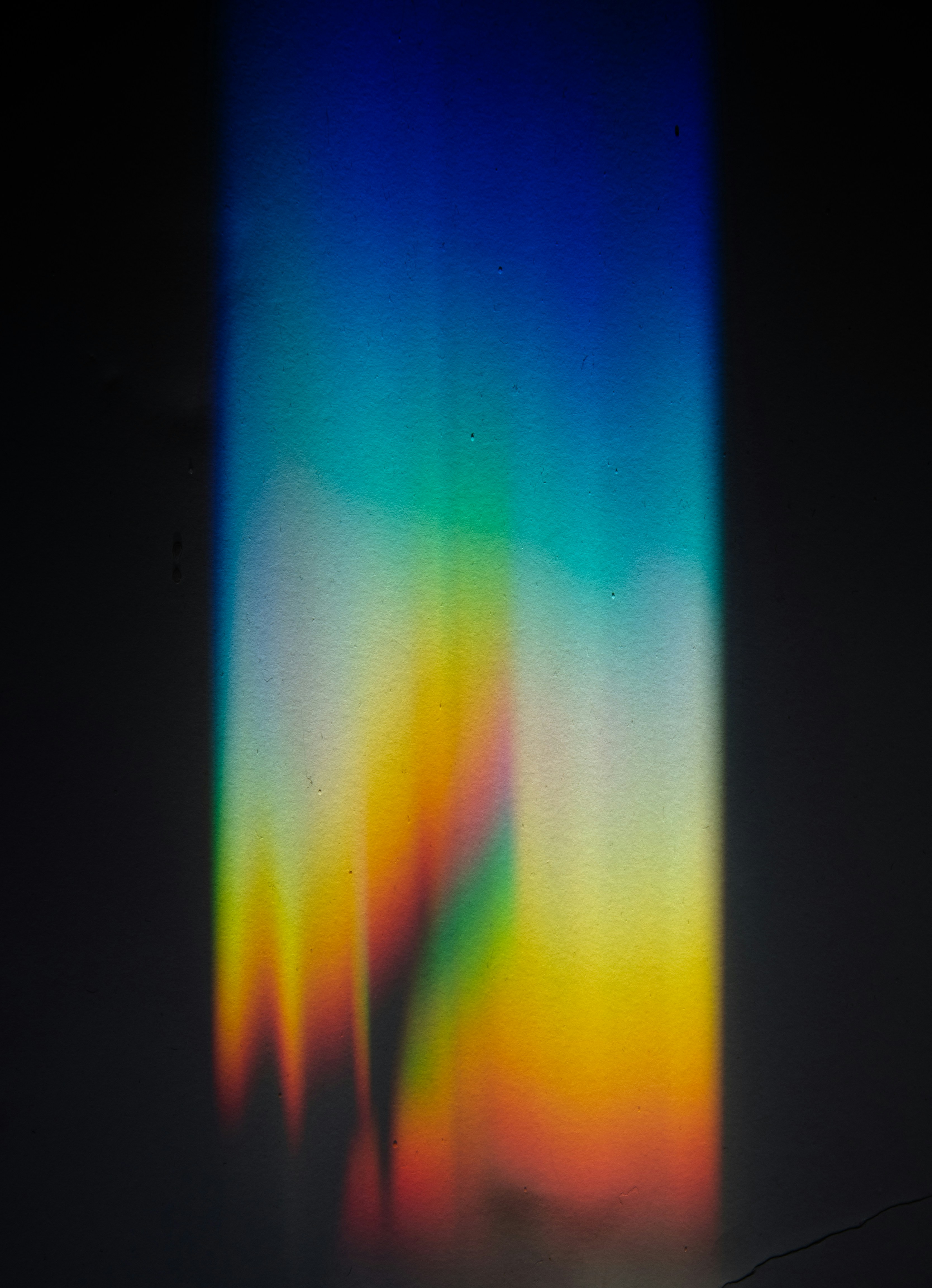 Spectrum Light Projection on Dark Wall