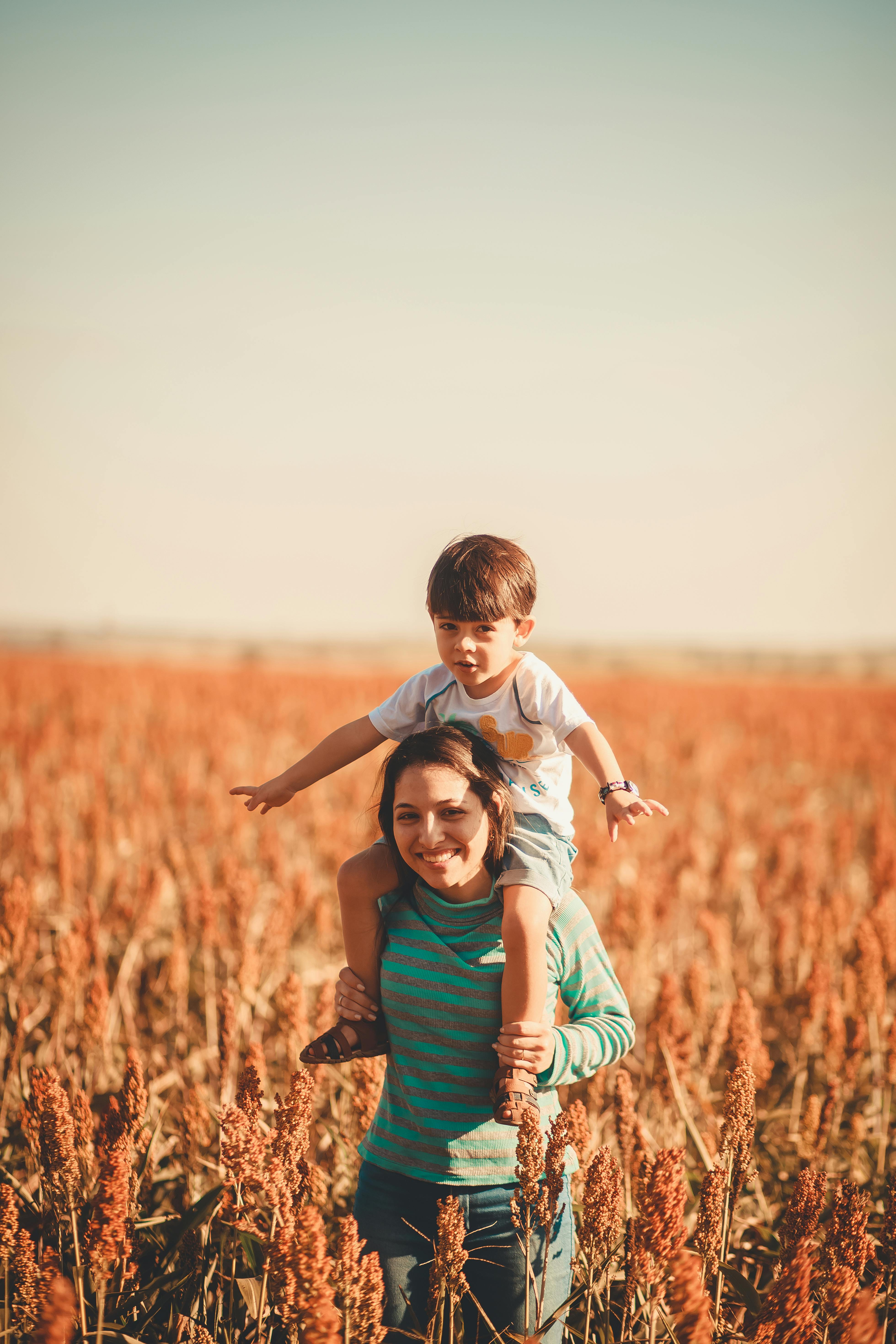 Mother and Son in Sorghum Field