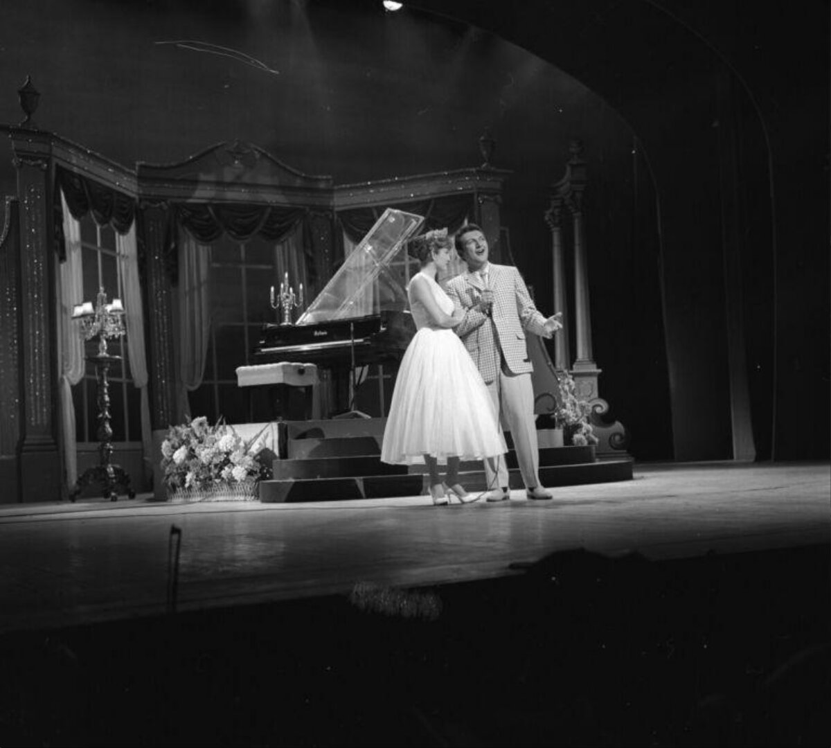 Two Singers Performing on Stage