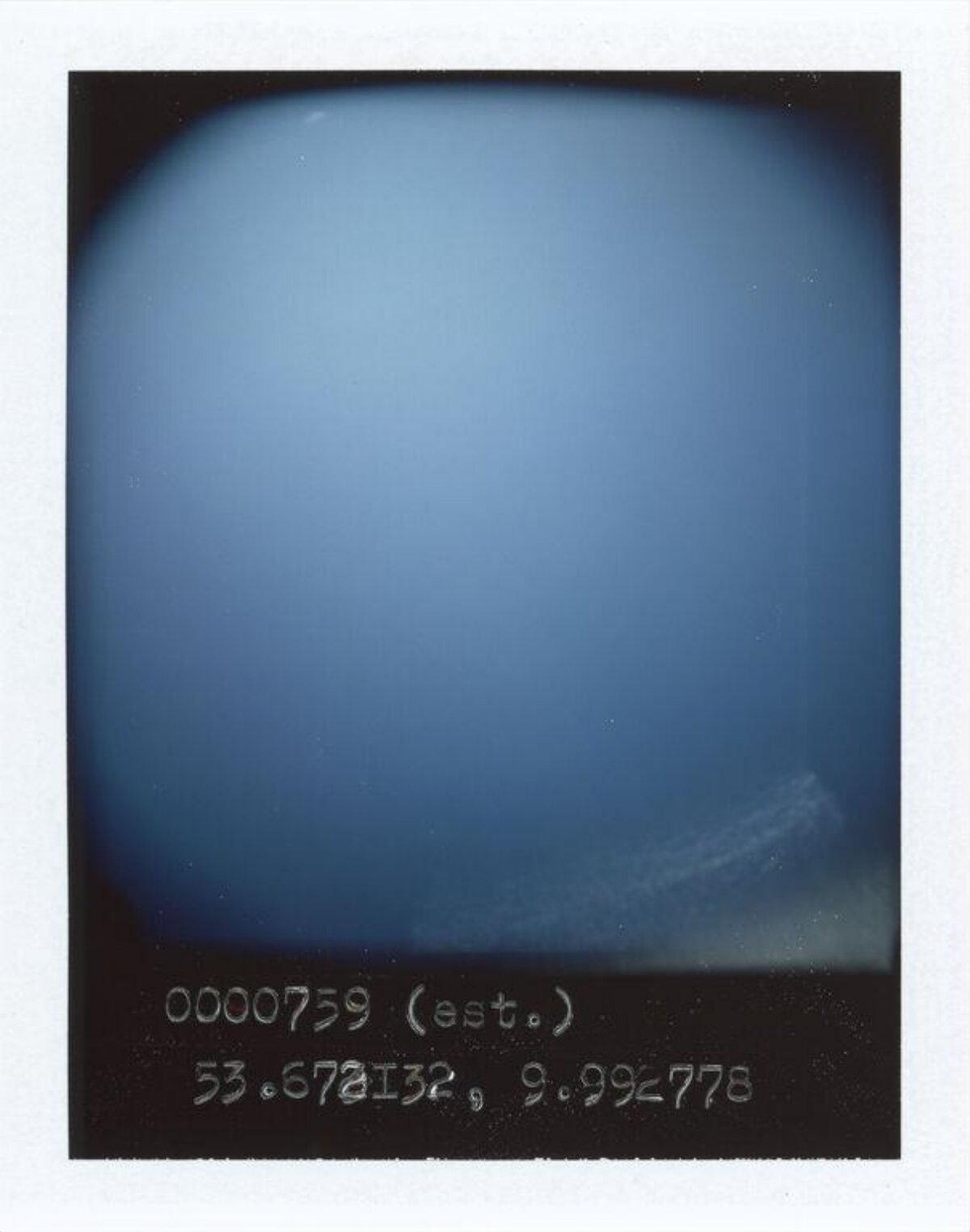 Polaroid of Blue Sky with Coordinates