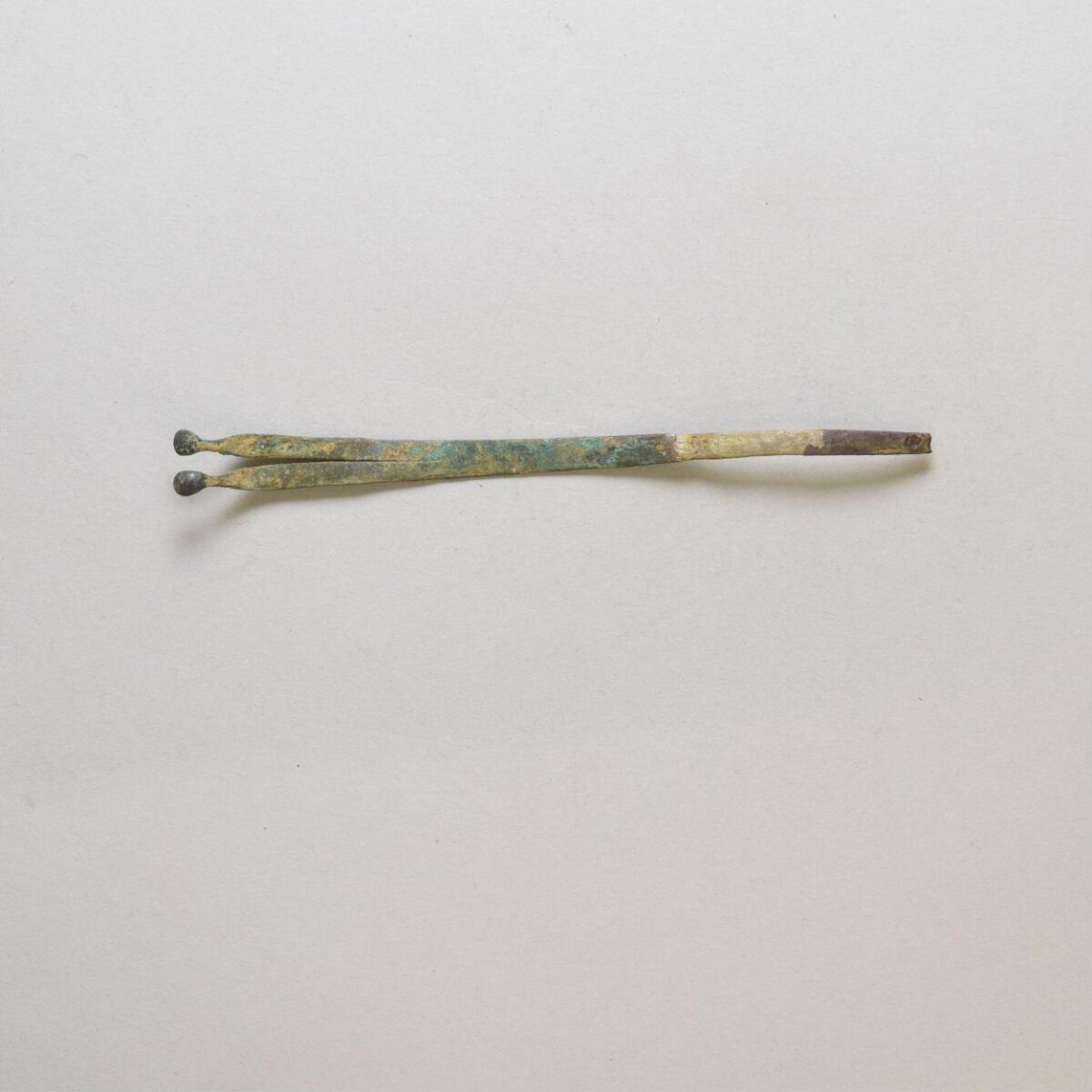 Ancient Bronze Tweezers Artifact