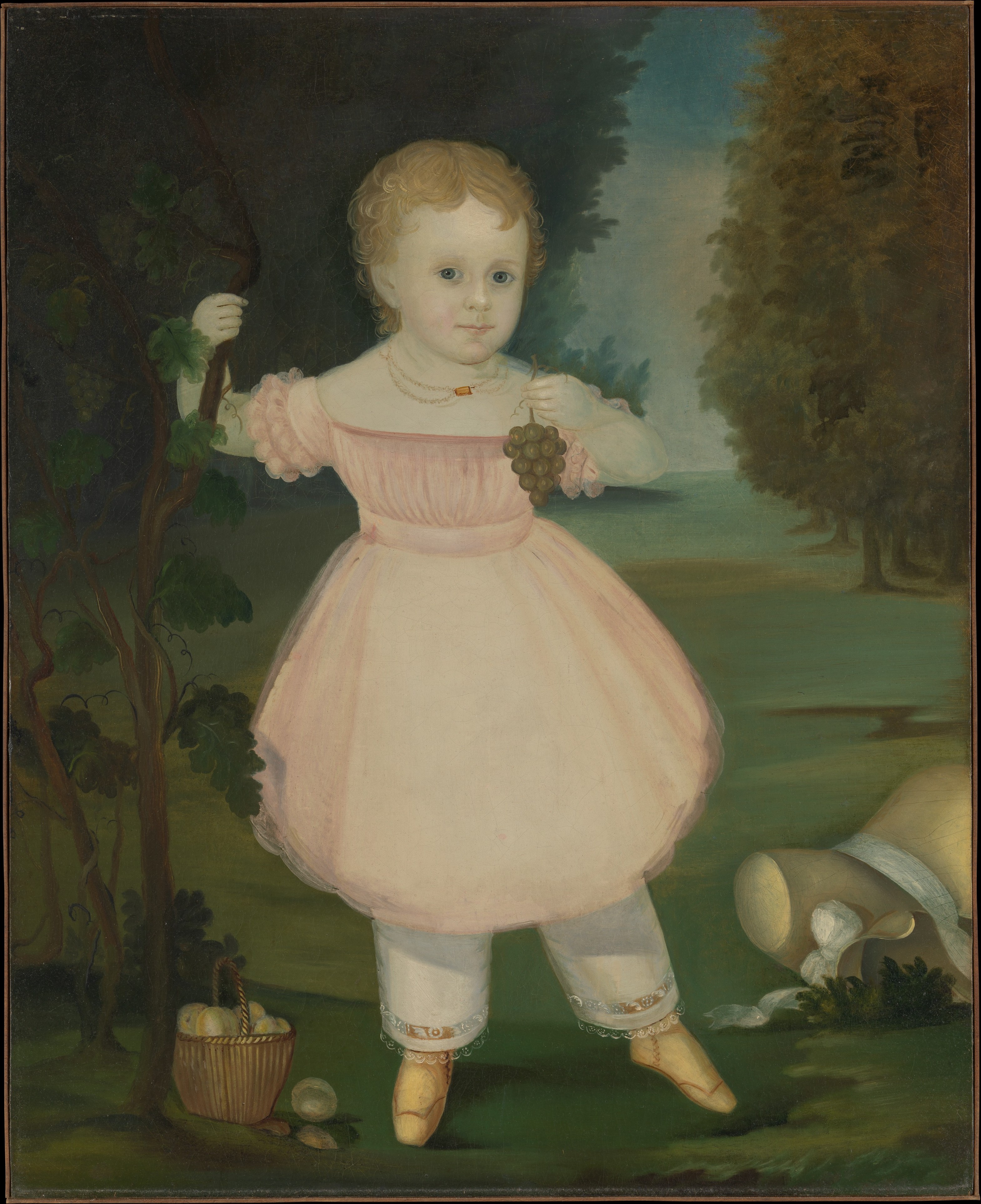 Portrait of Toddler Holding Grapes