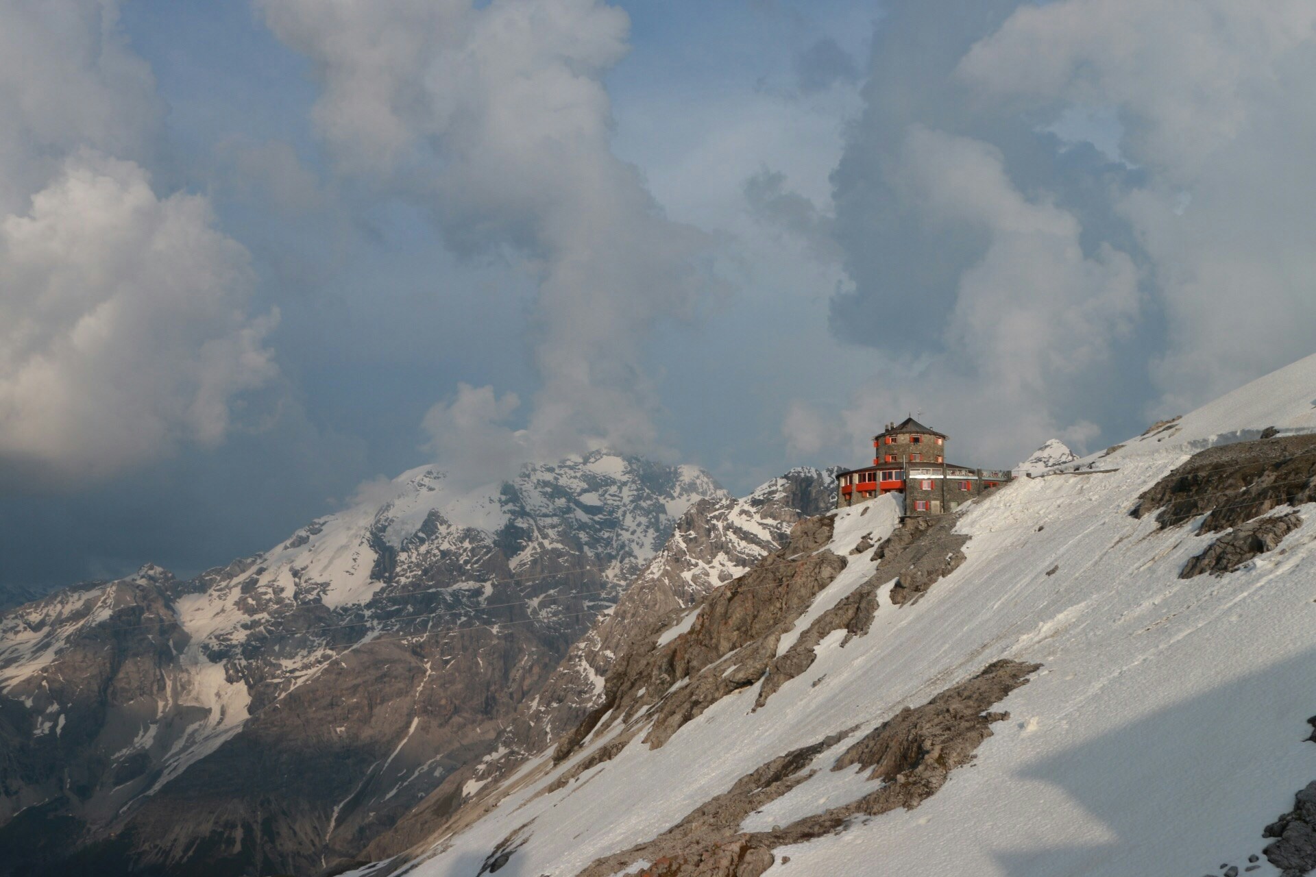 Alpine Mountain Hut on Snowy Slope
