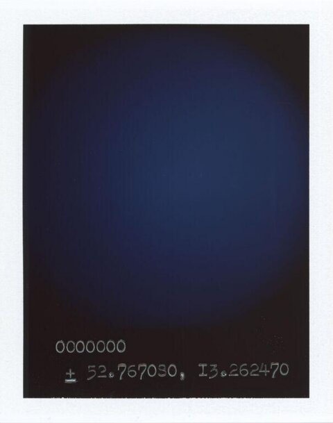 Polaroid with Handwritten Coordinates