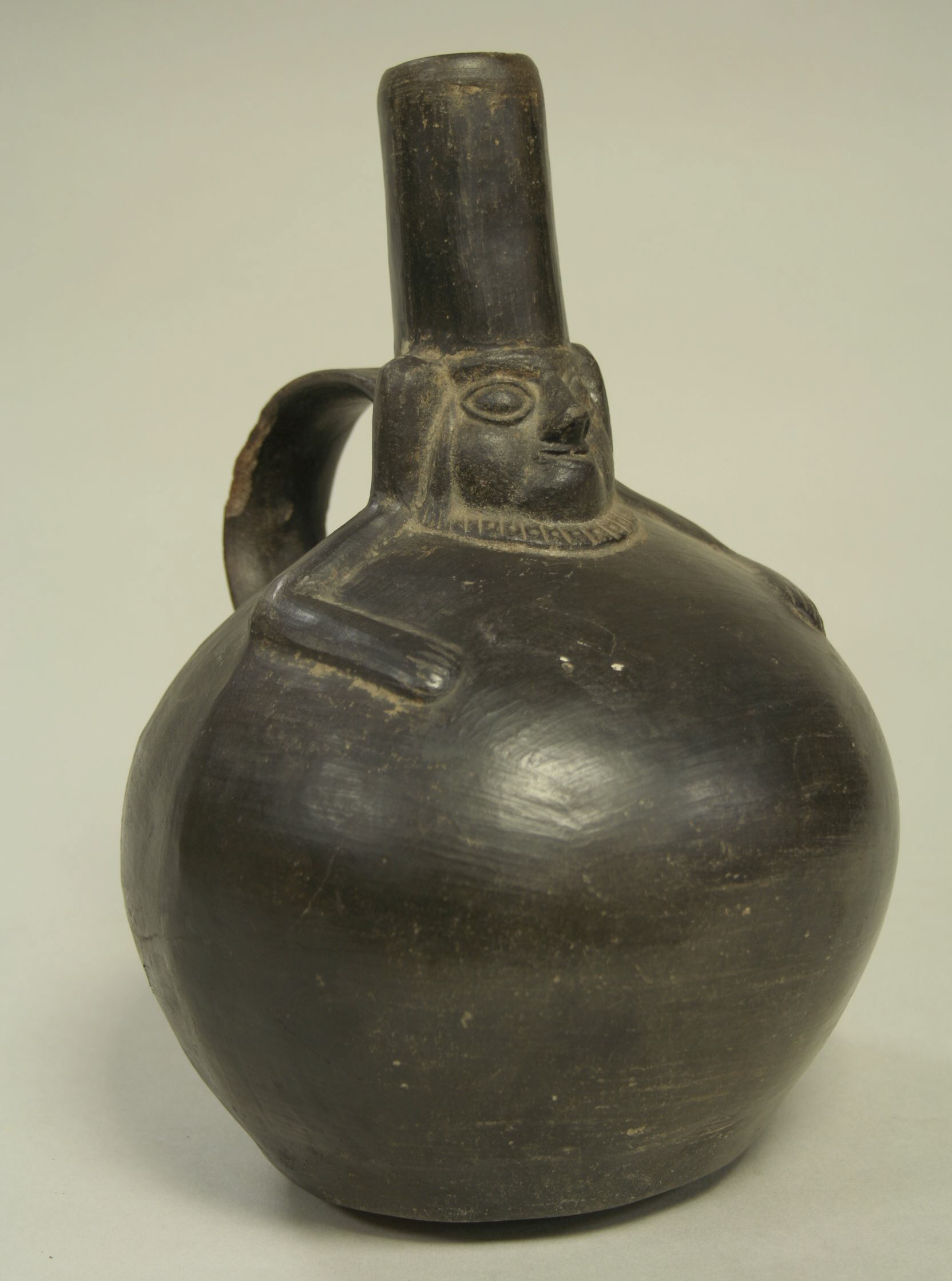 Black Anthropomorphic Ancient Pottery Bottle