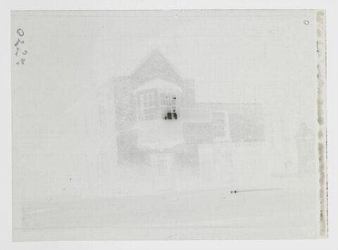 Faded Negative of Stone Building Entrance