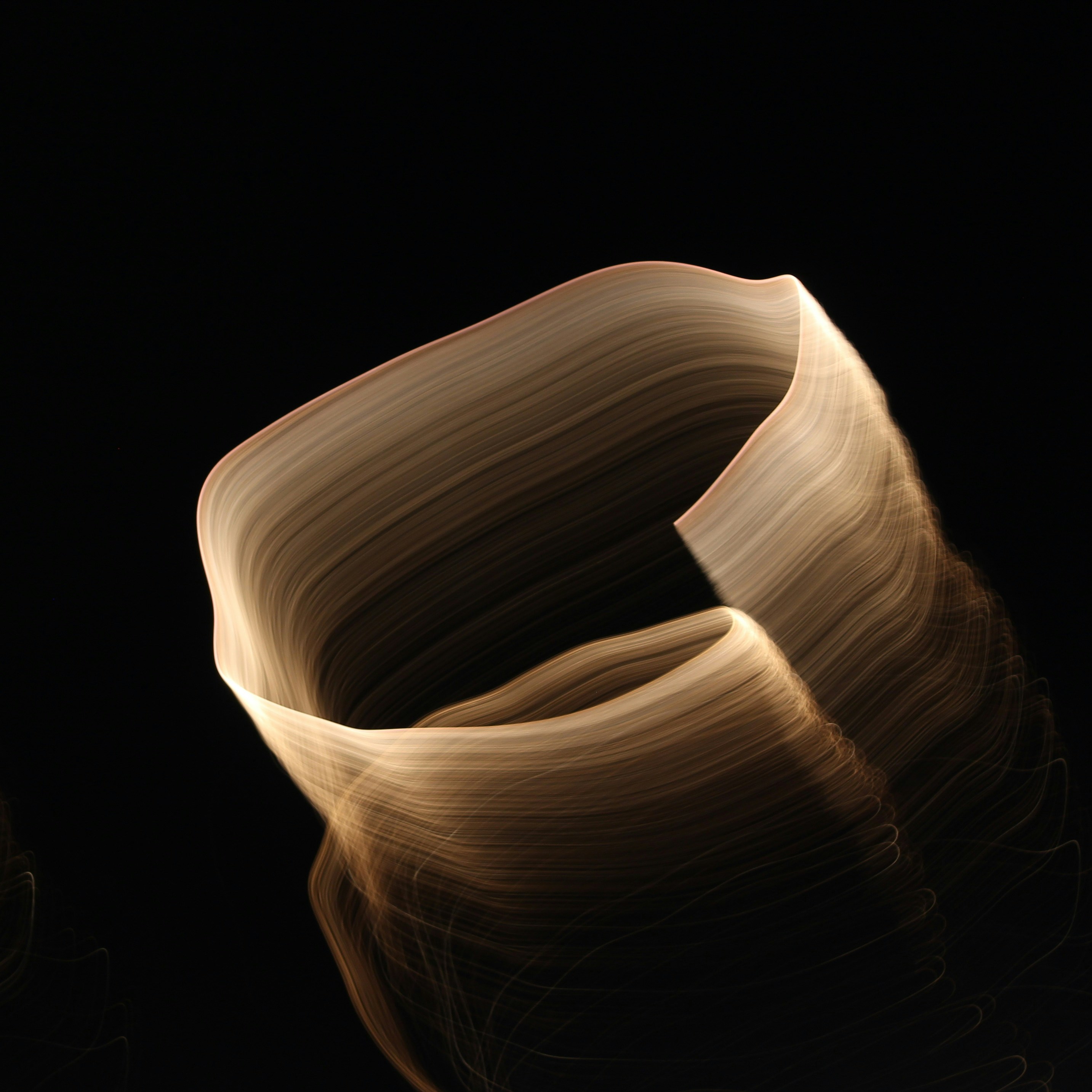 Golden Light Painting on Black Background
