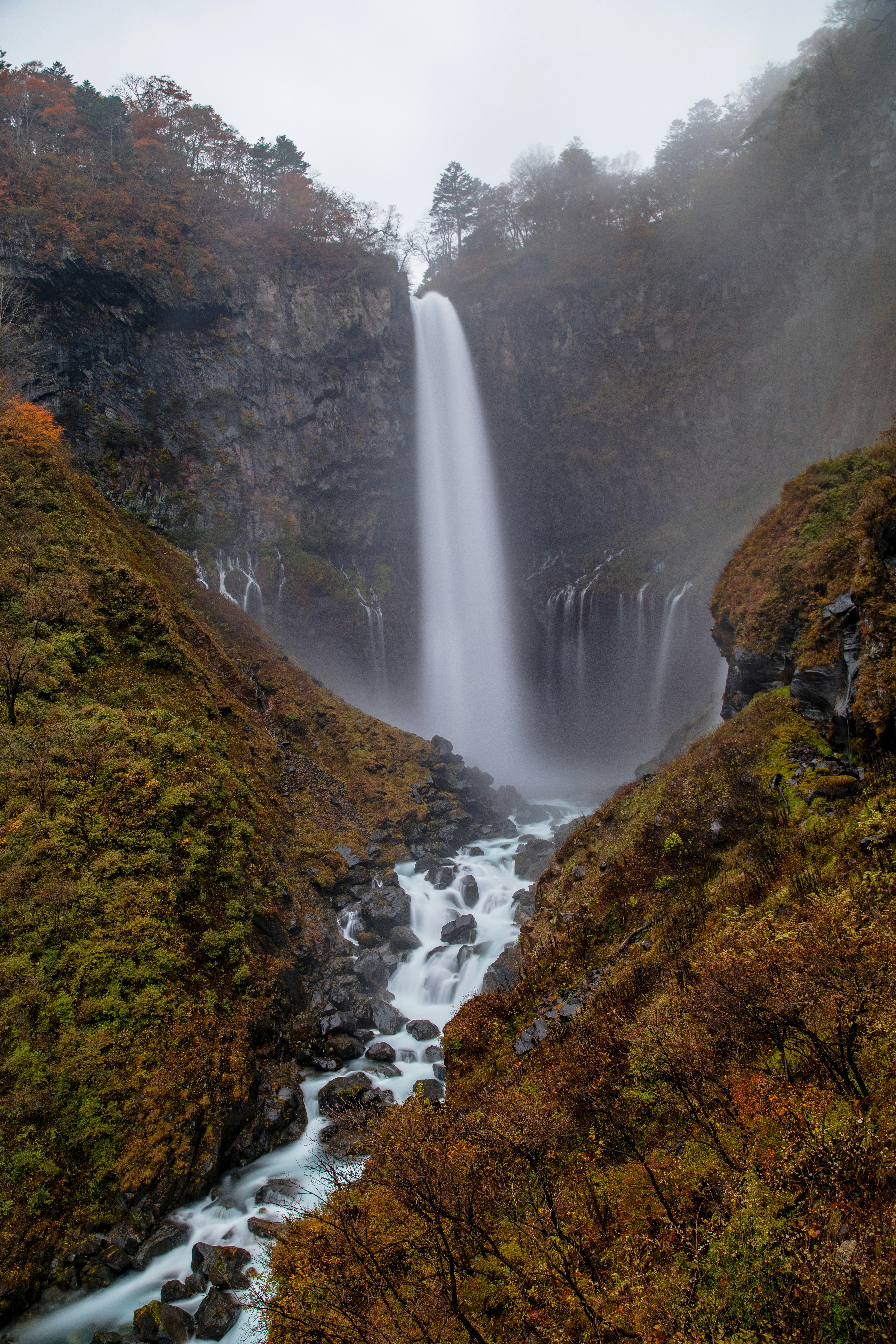 Autumn Waterfall in Mountain Gorge