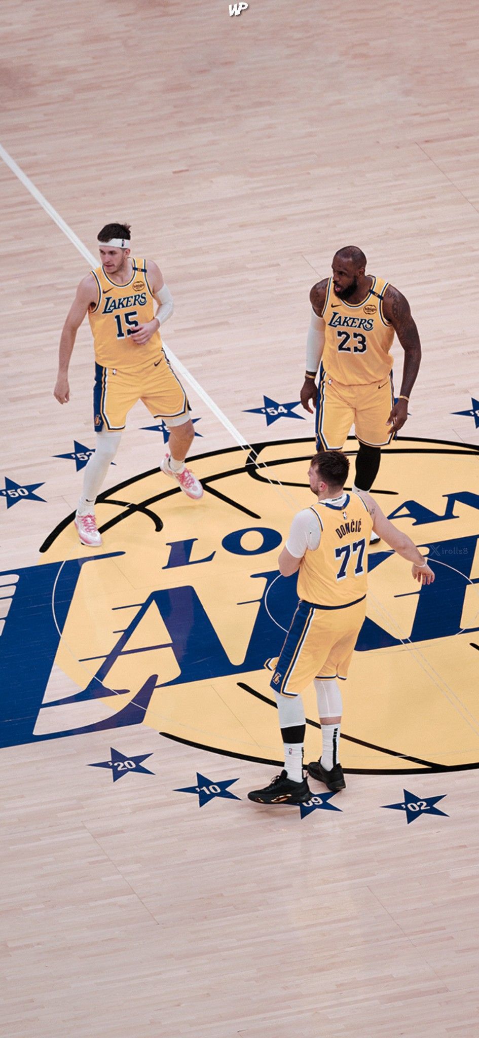 Three Players on Lakers Home Court