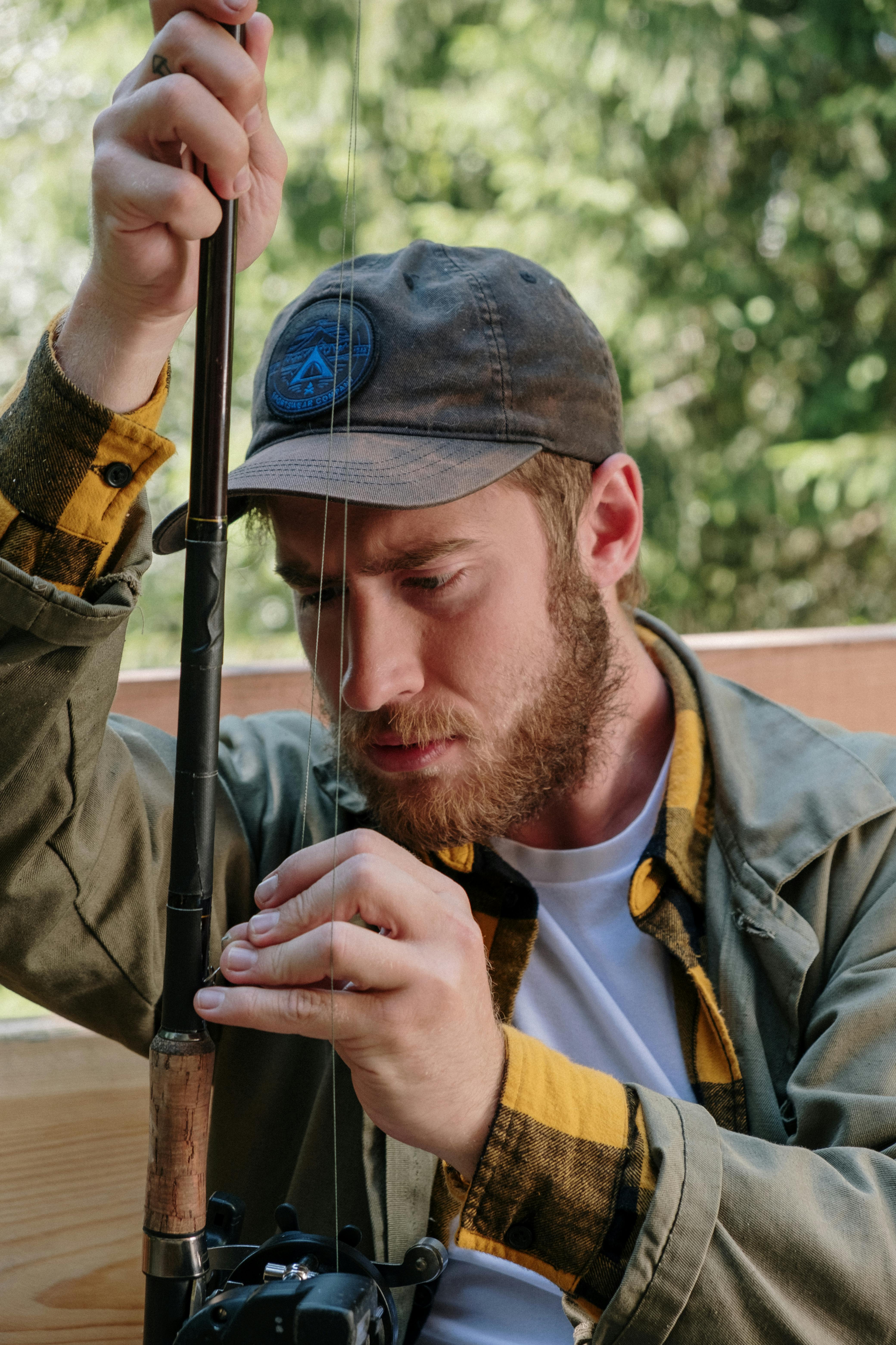 Man Preparing Fishing Rod
