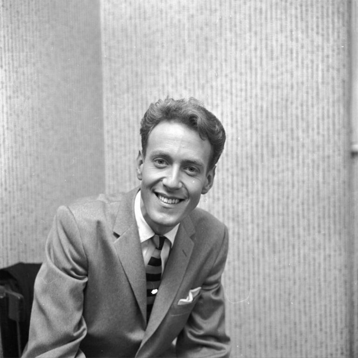 Vintage Portrait of Smiling Man in Suit