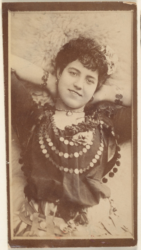Vintage Portrait of Woman in Decorated Costume