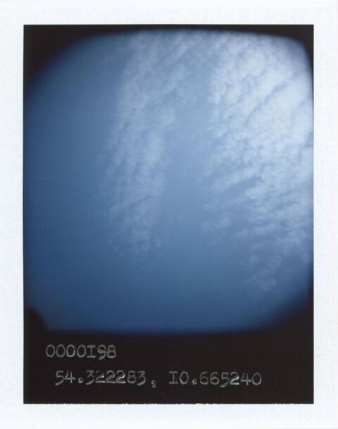 Polaroid of Blue Sky and Clouds