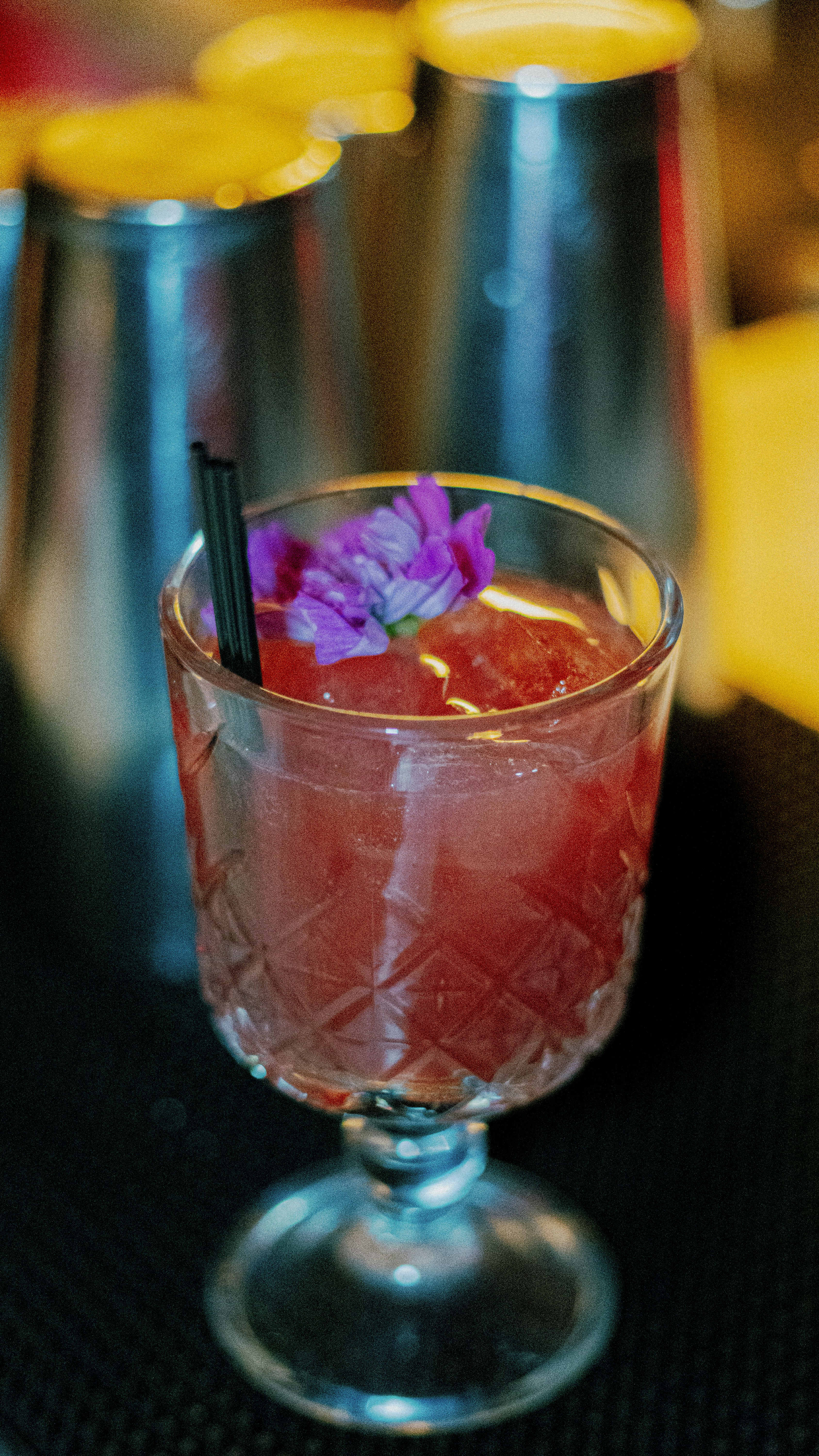 Garnished Red Cocktail on Bar
