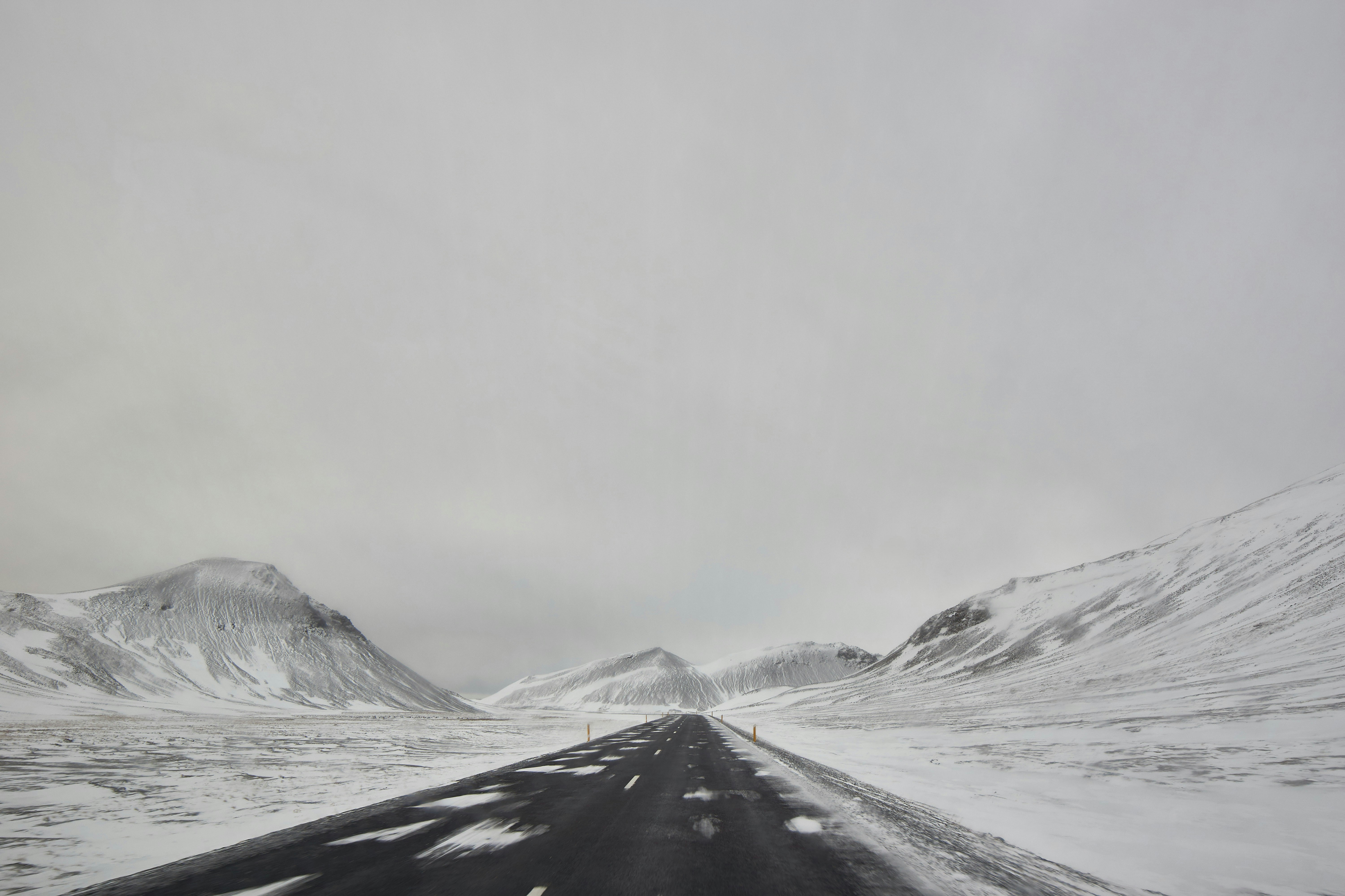 Snowy Road Between Snow Mountains