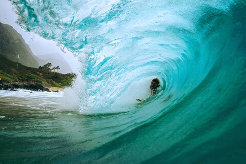 Surfer Inside Barreling Ocean Wave