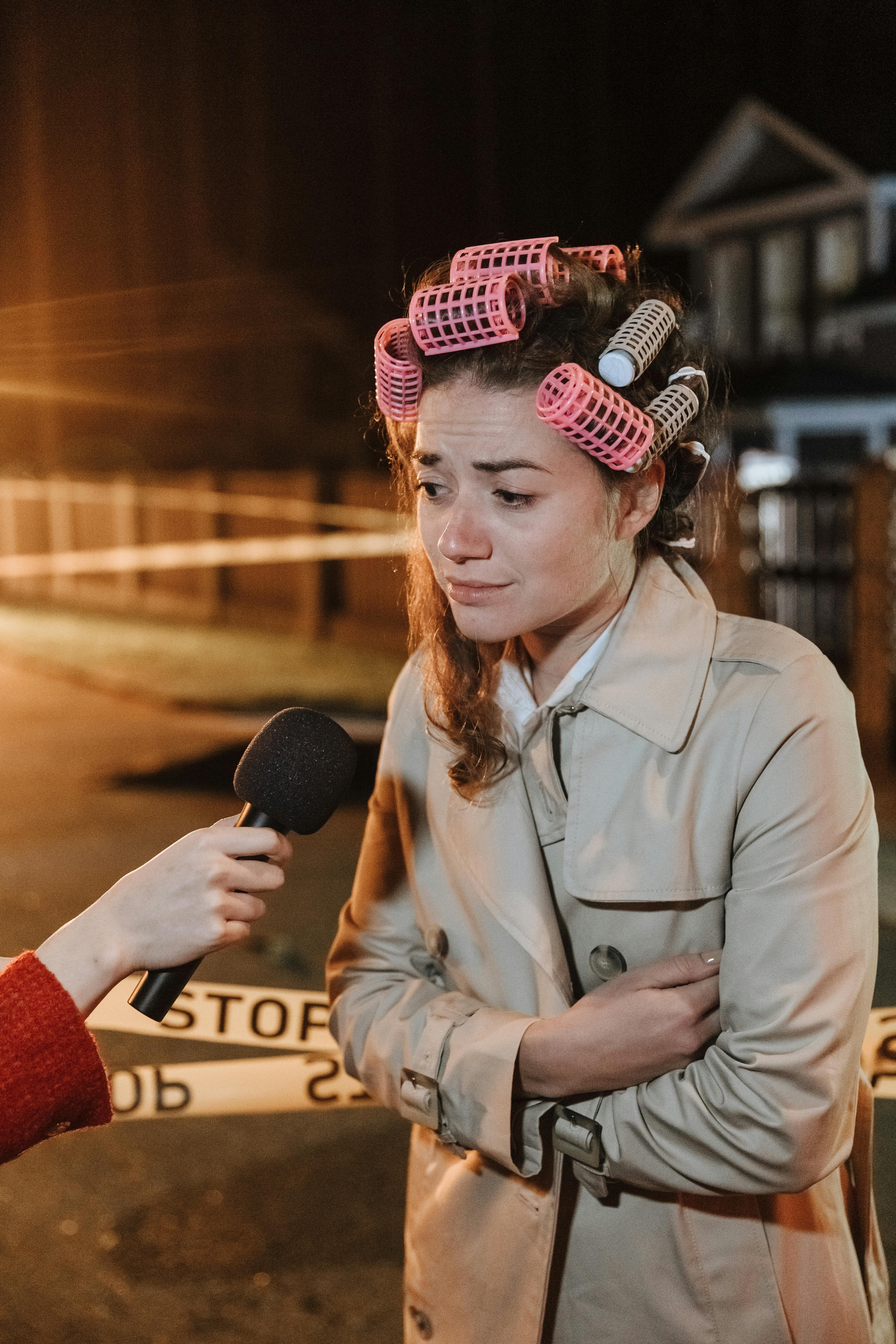 Emotional Woman Interviewed At Crime Scene