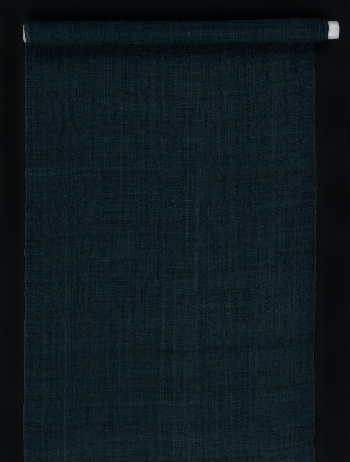 Rolled Dark Teal Woven Fabric