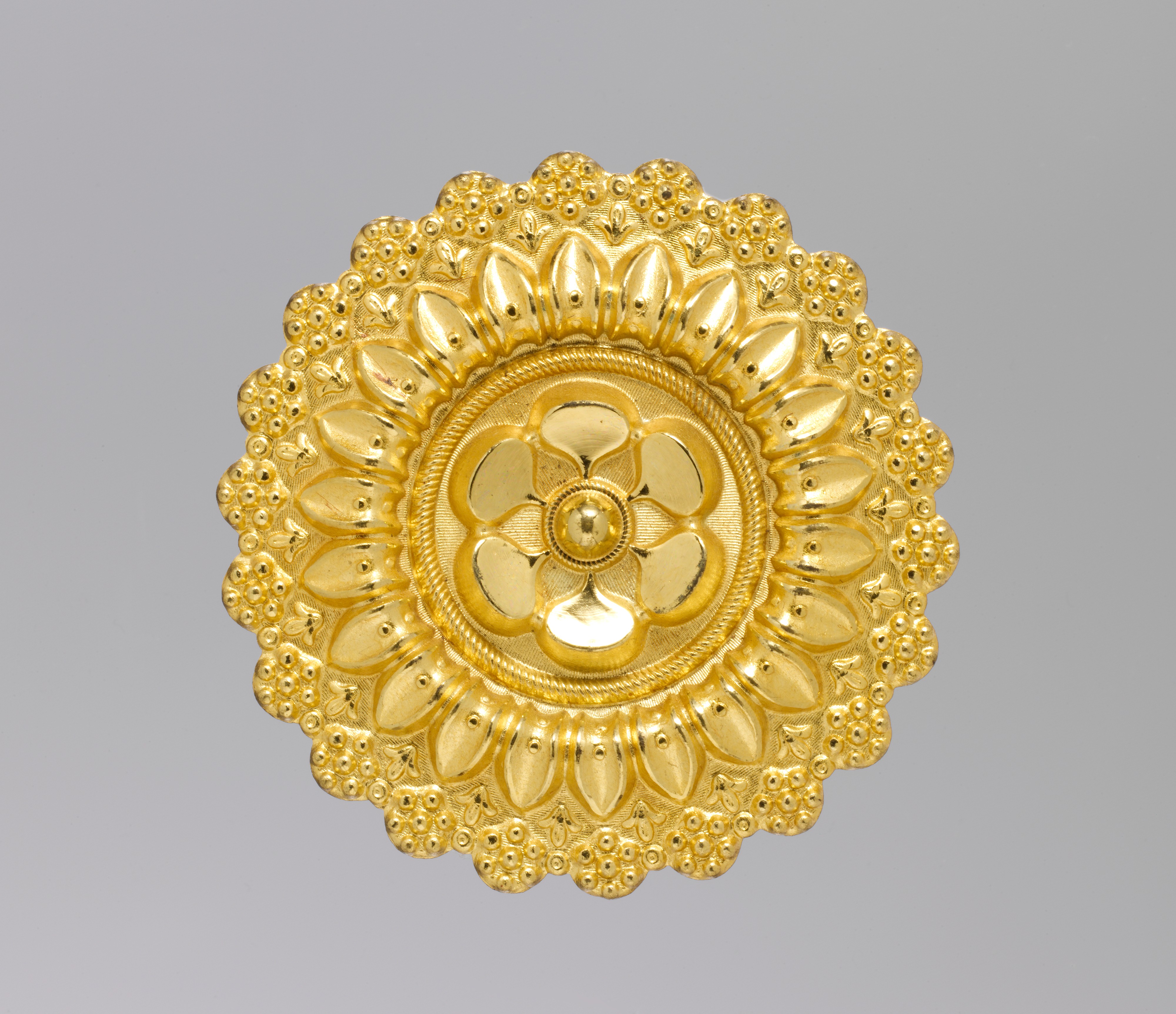 Ancient Round Patterned Gold Ornament