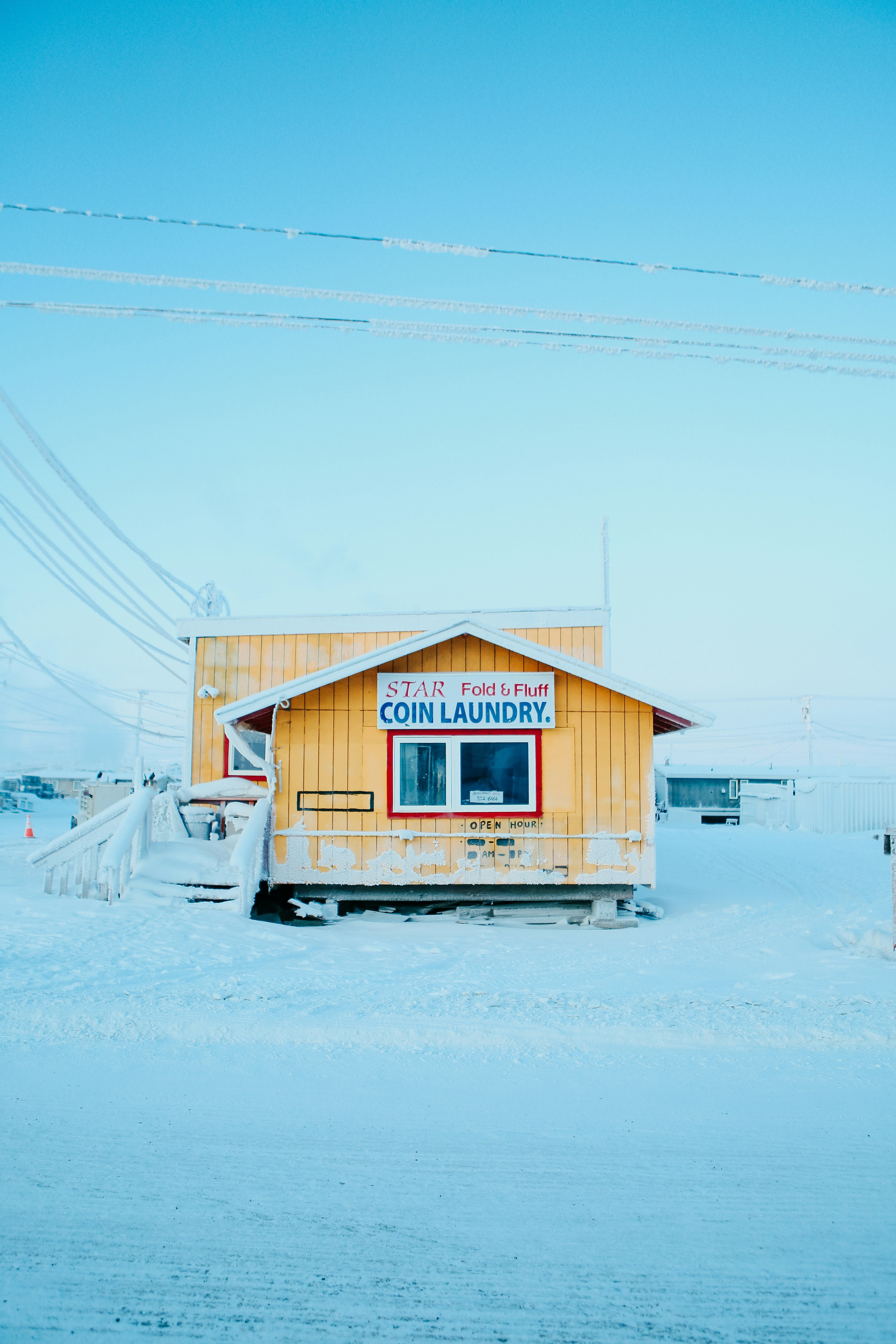 Snow Covered Coin Laundry Building