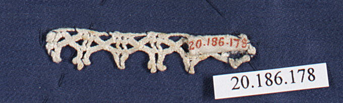 Openwork Artifact With Museum Label