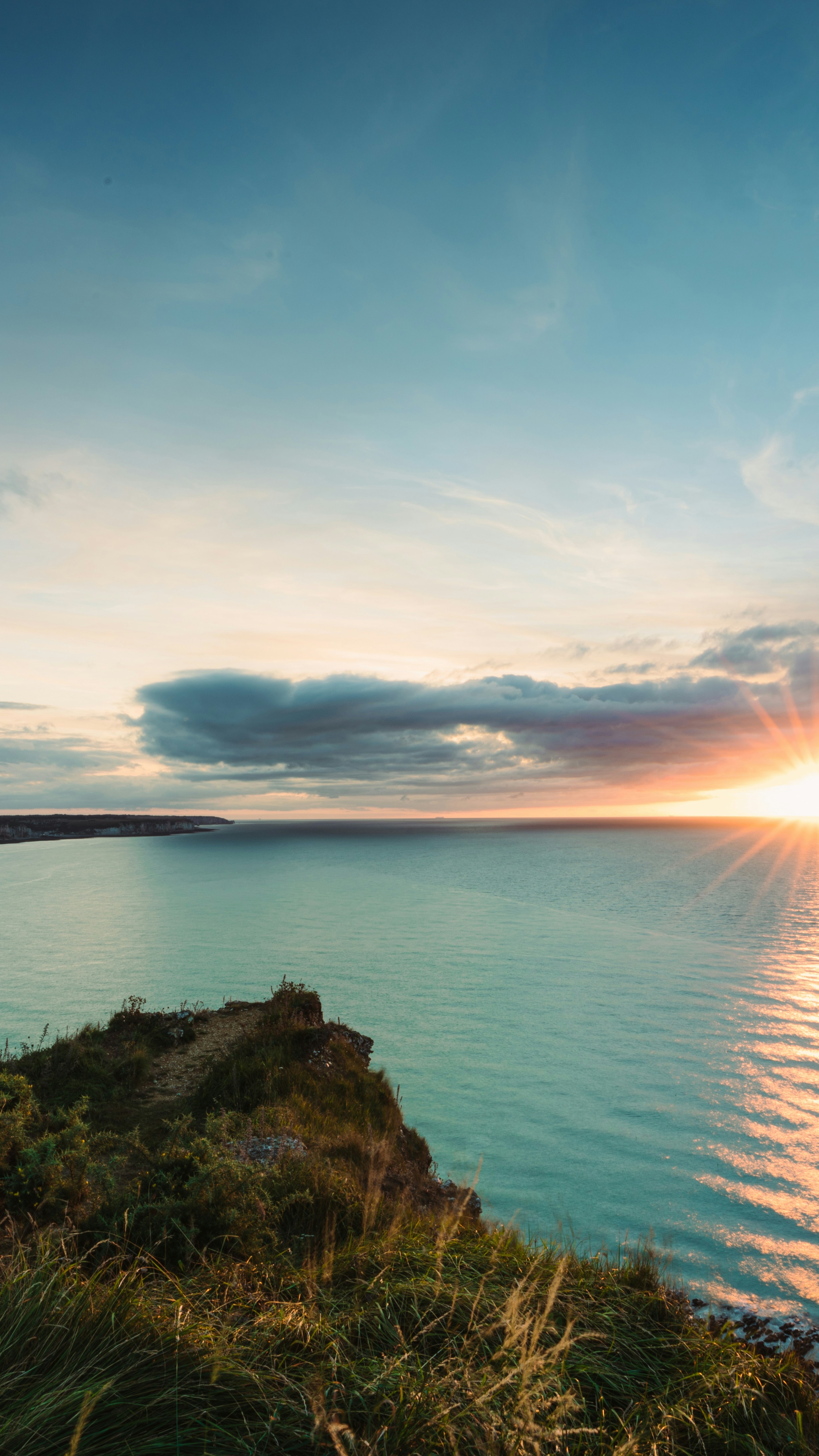 Cliffside Ocean Sunset View