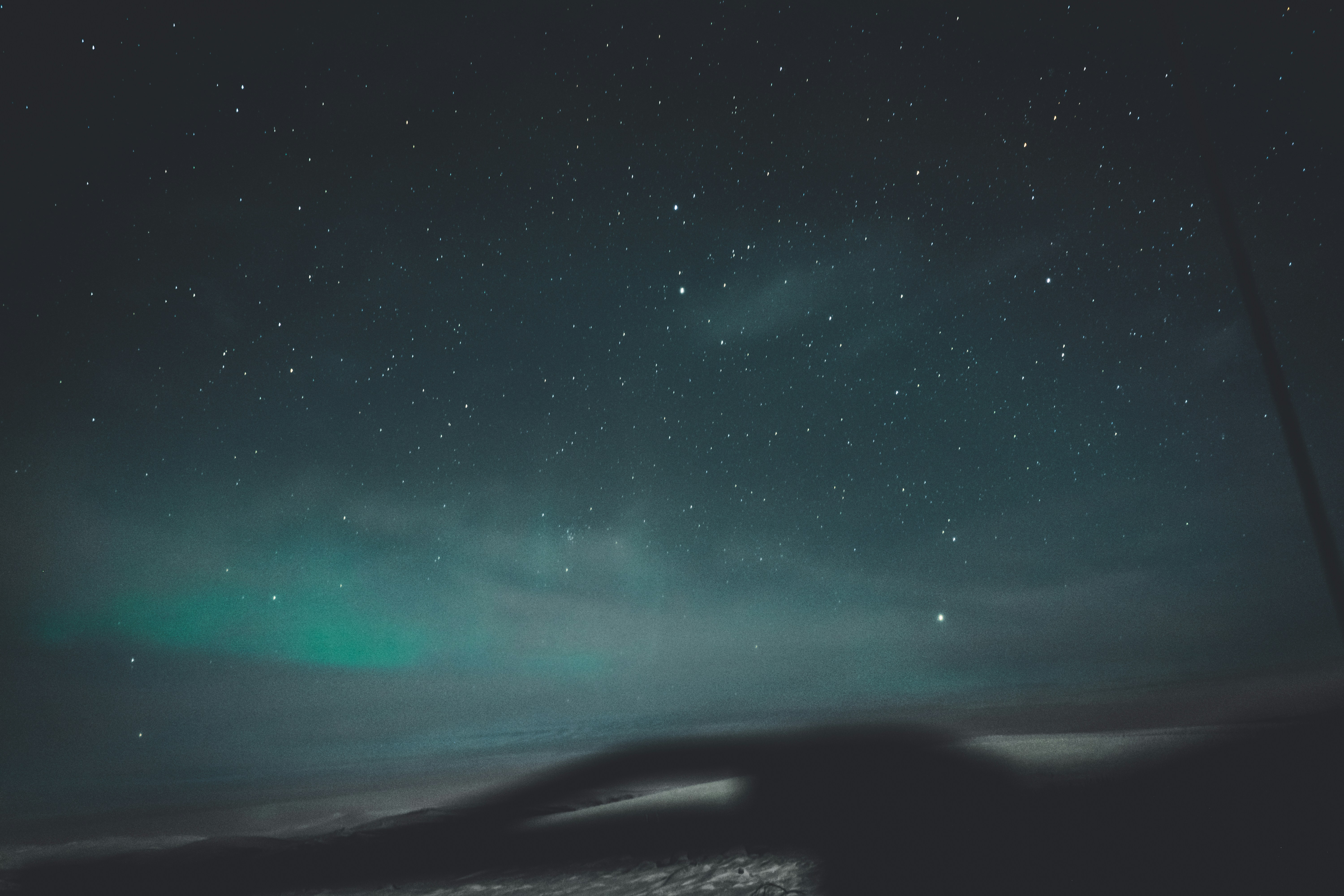 Aurora Under Starry Night Sky