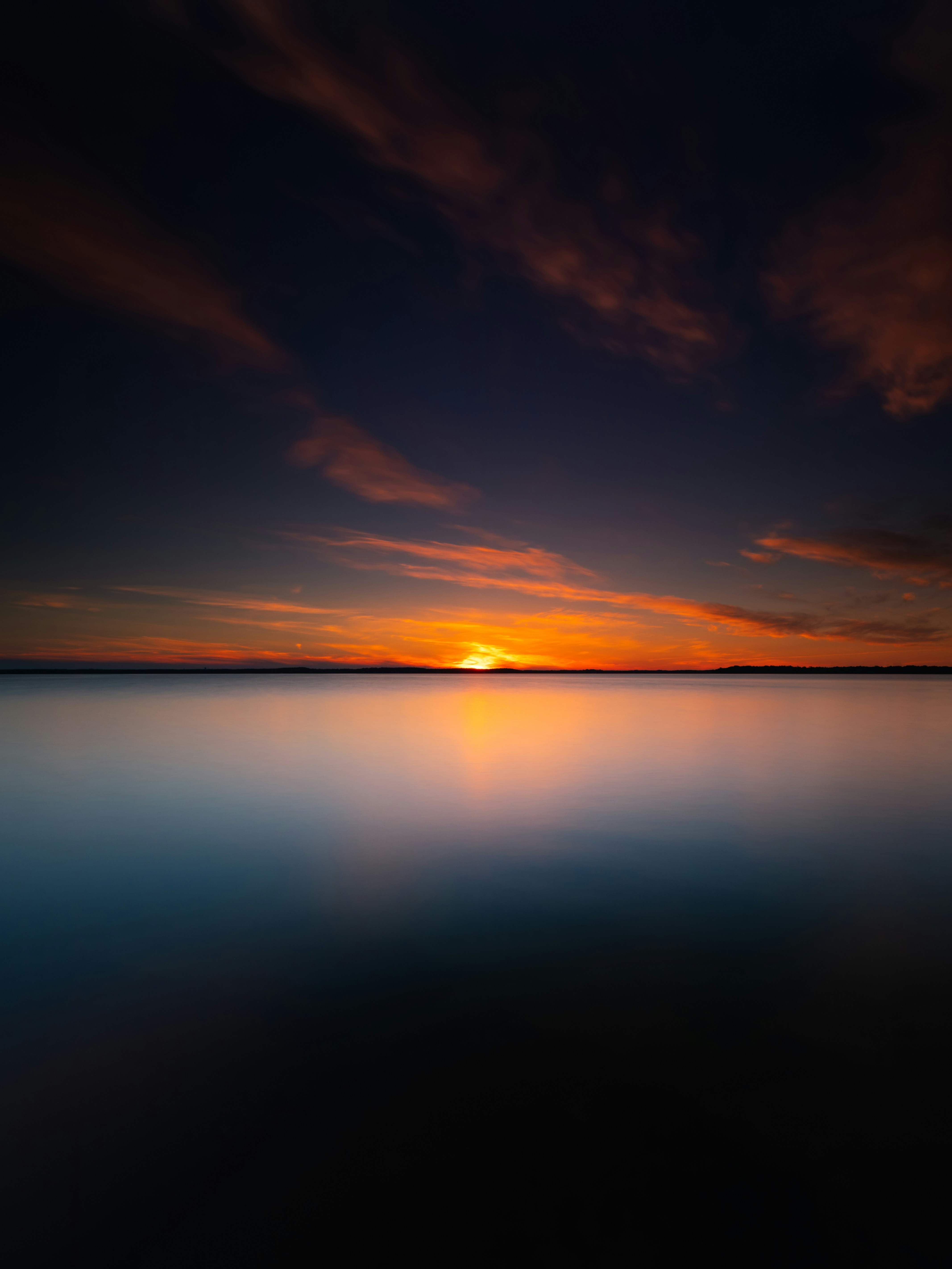 Sunset Over Calm Lake