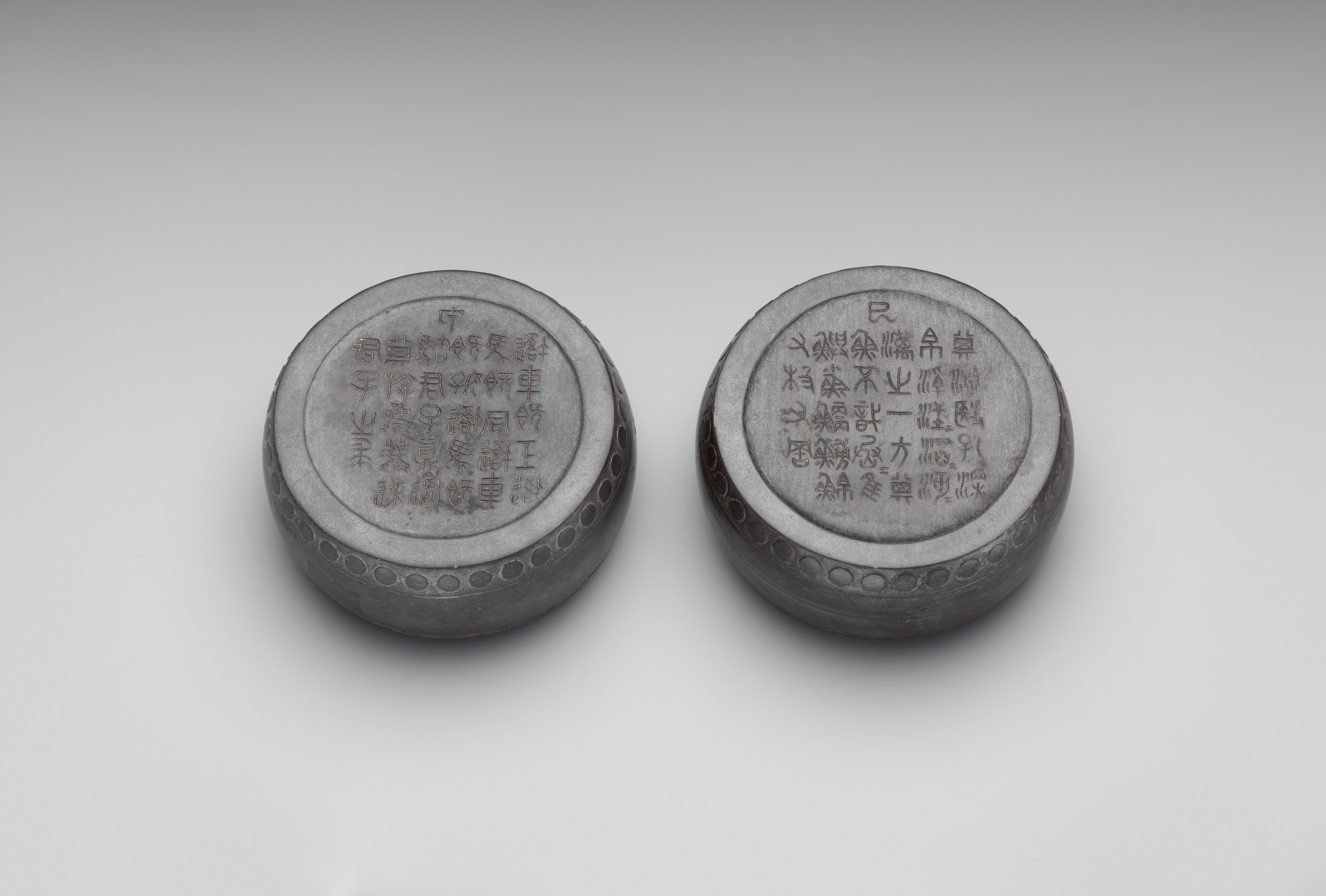 Pair of Inscribed Ancient Round Wares