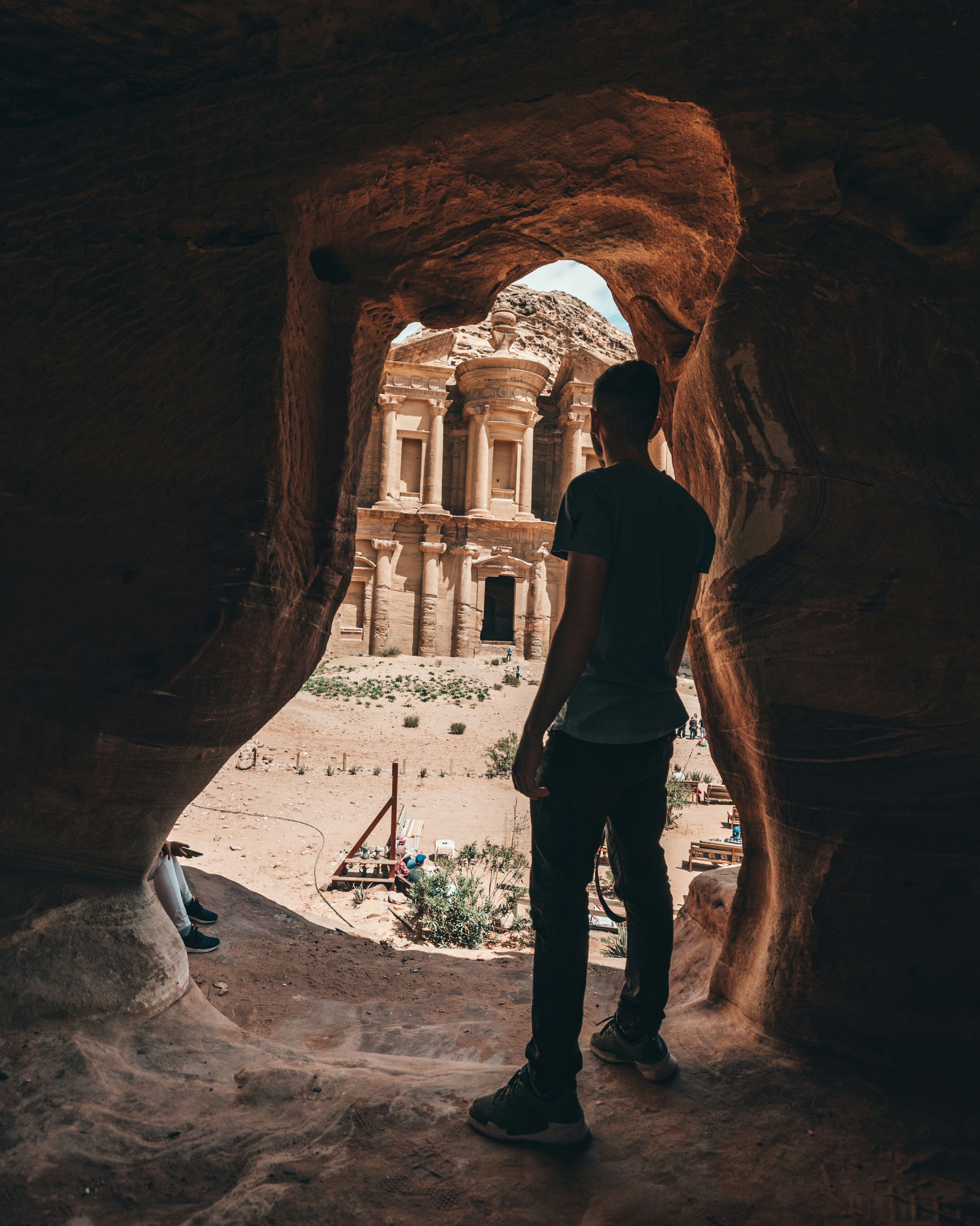 Man Viewing Petra From a Cave