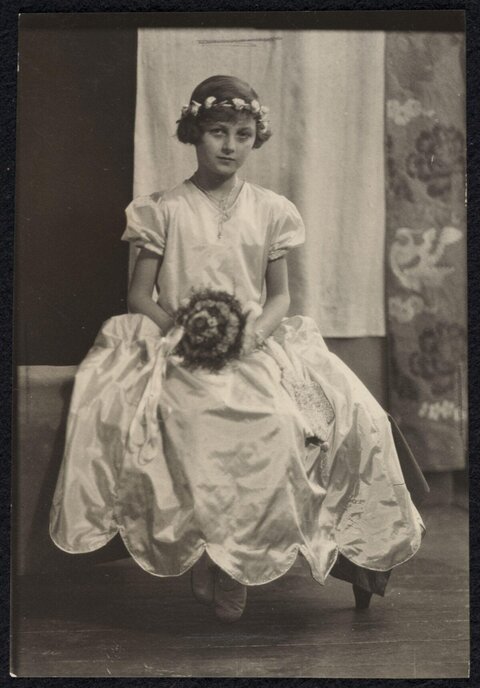 Vintage Portrait of Young Woman with Flowers
