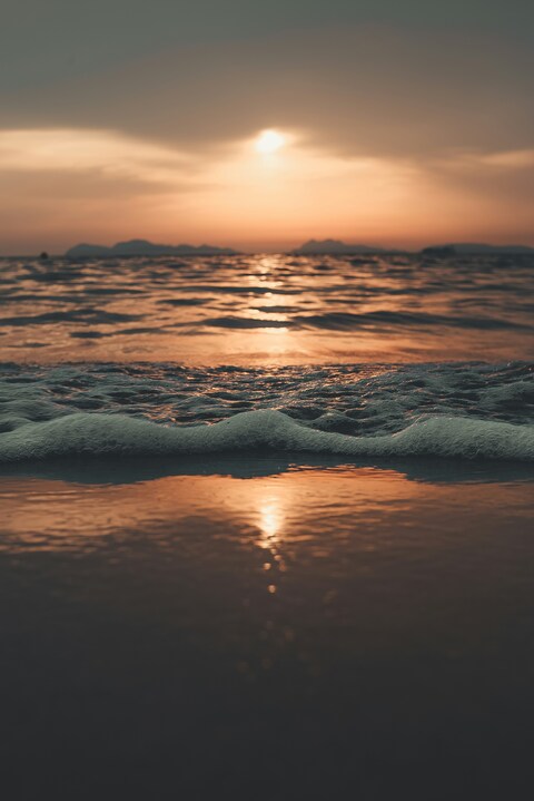 Beach Sunset Over Ocean