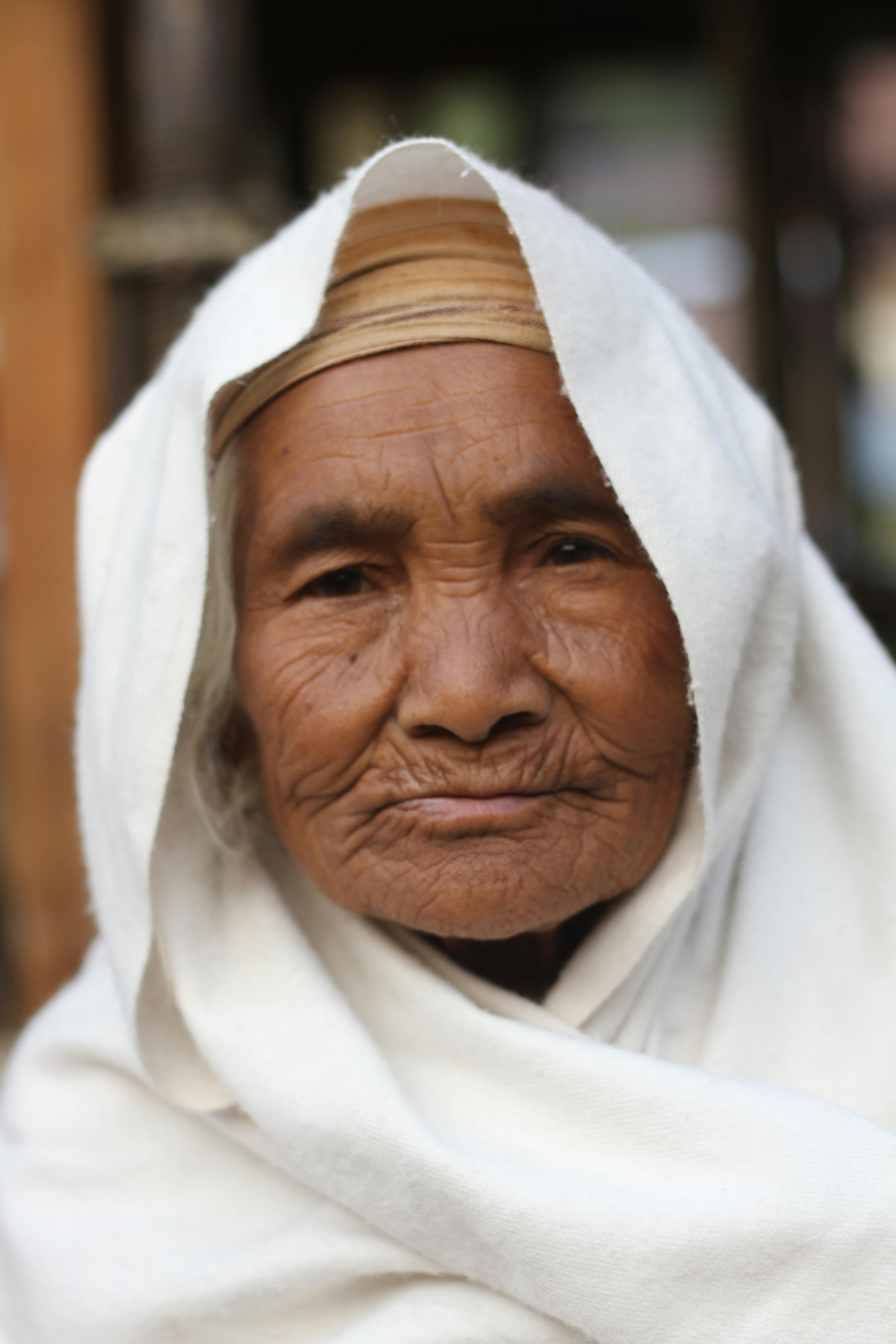 Elderly Woman with White Head Wrap