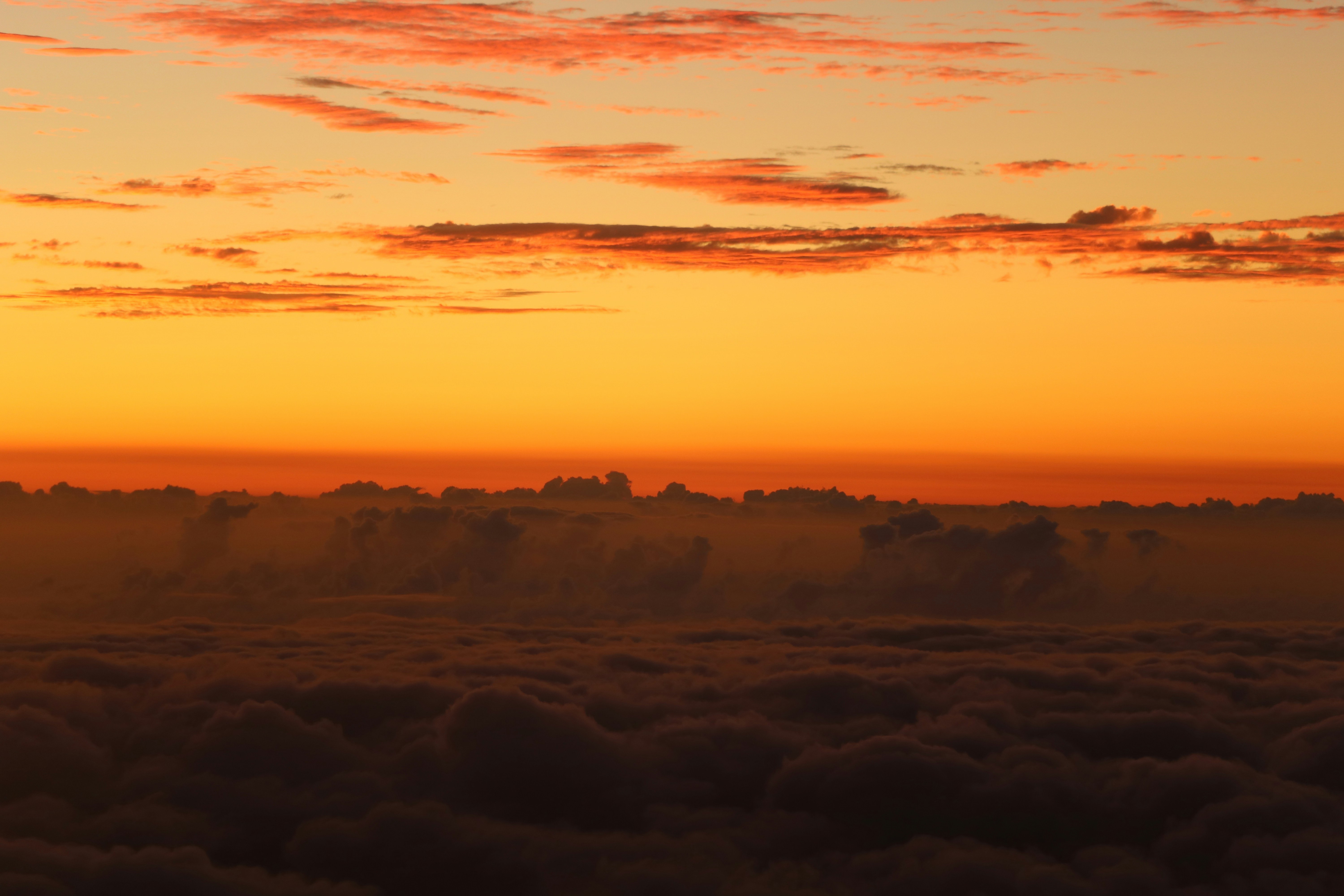 Sunset Above Sea of Clouds