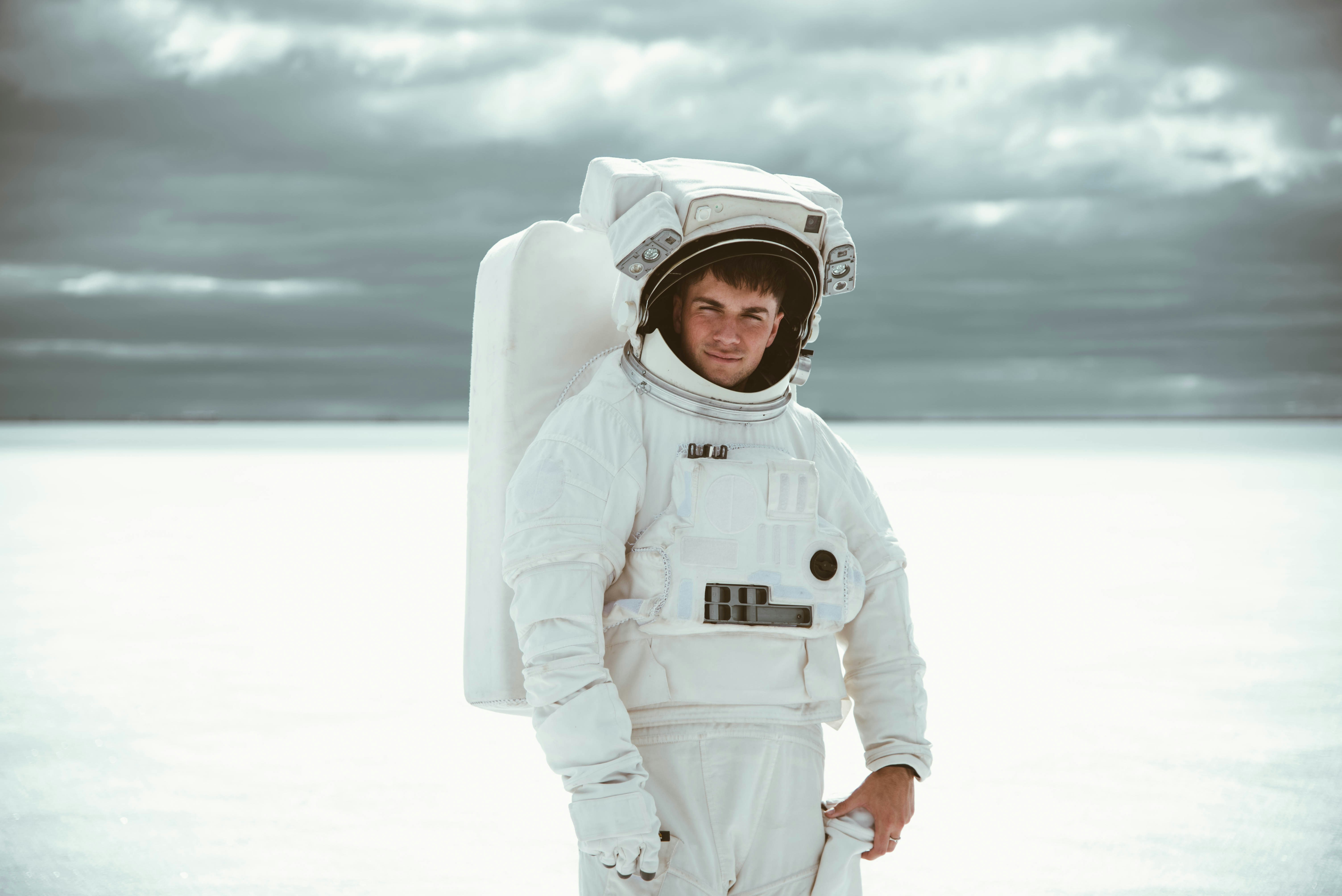 Astronaut Standing on White Plain