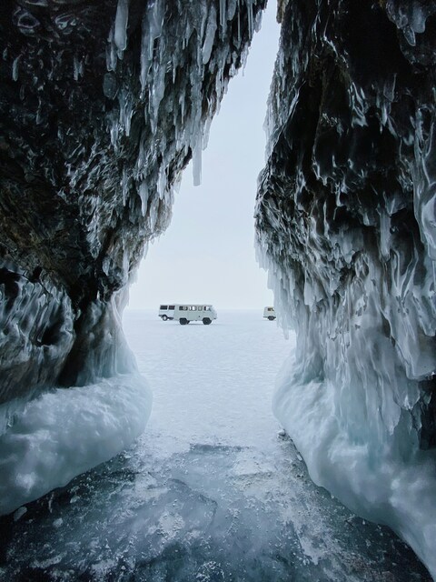 Ice Cave View of Frozen Lake