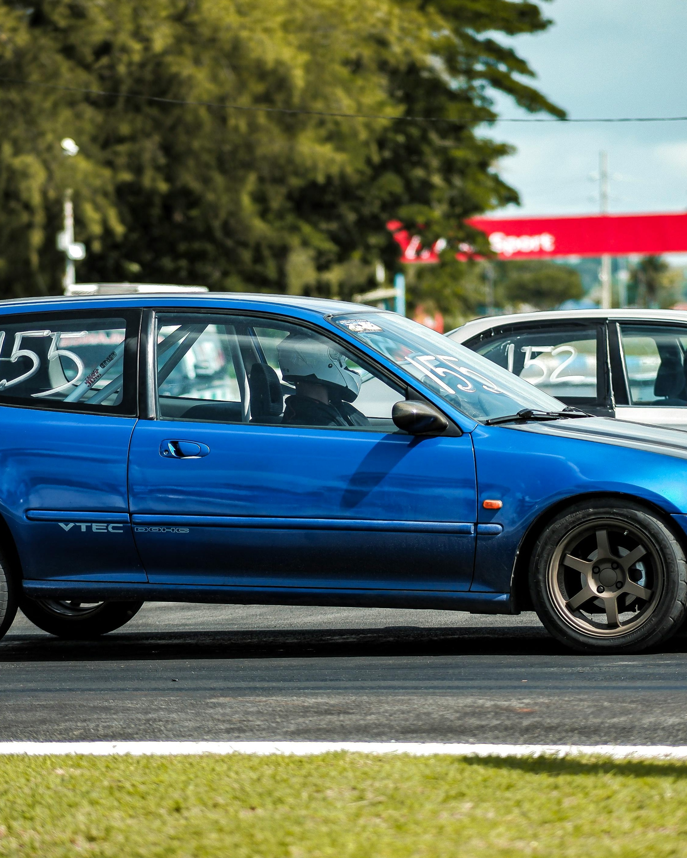 Blue VTEC Race Car on Track