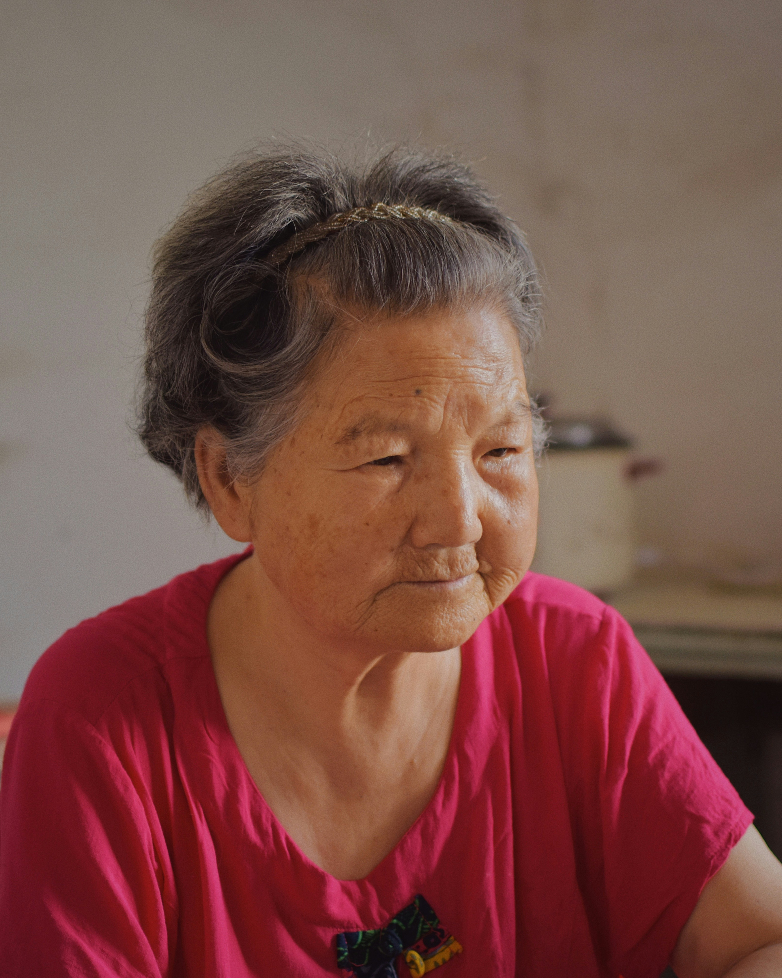 Portrait of Elderly Woman in Pink Top