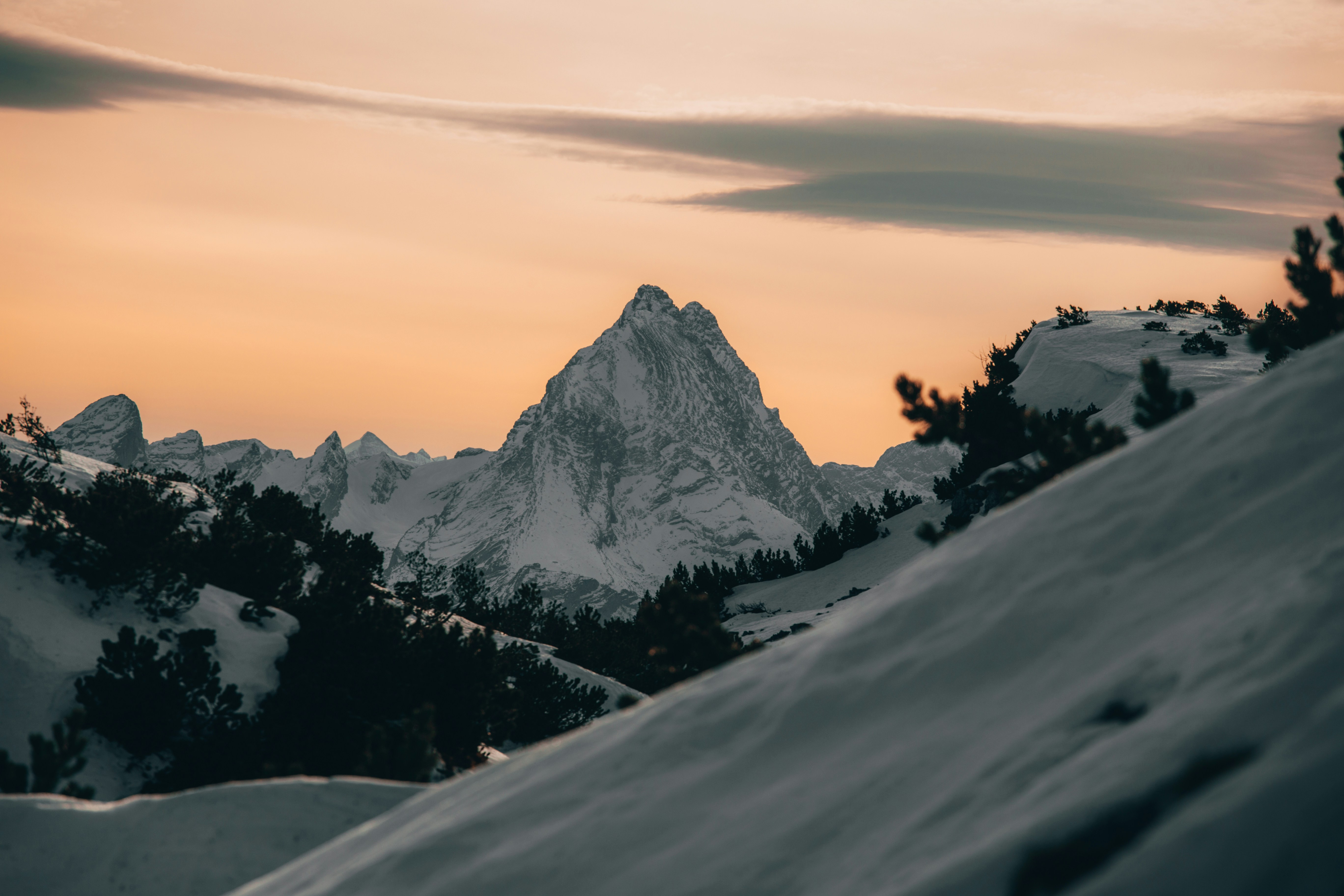 Snowy Mountain Peak at Sunset