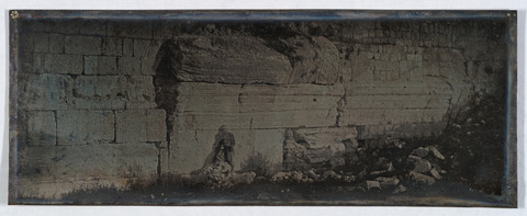 Ancient Stone Wall with Standing Figure